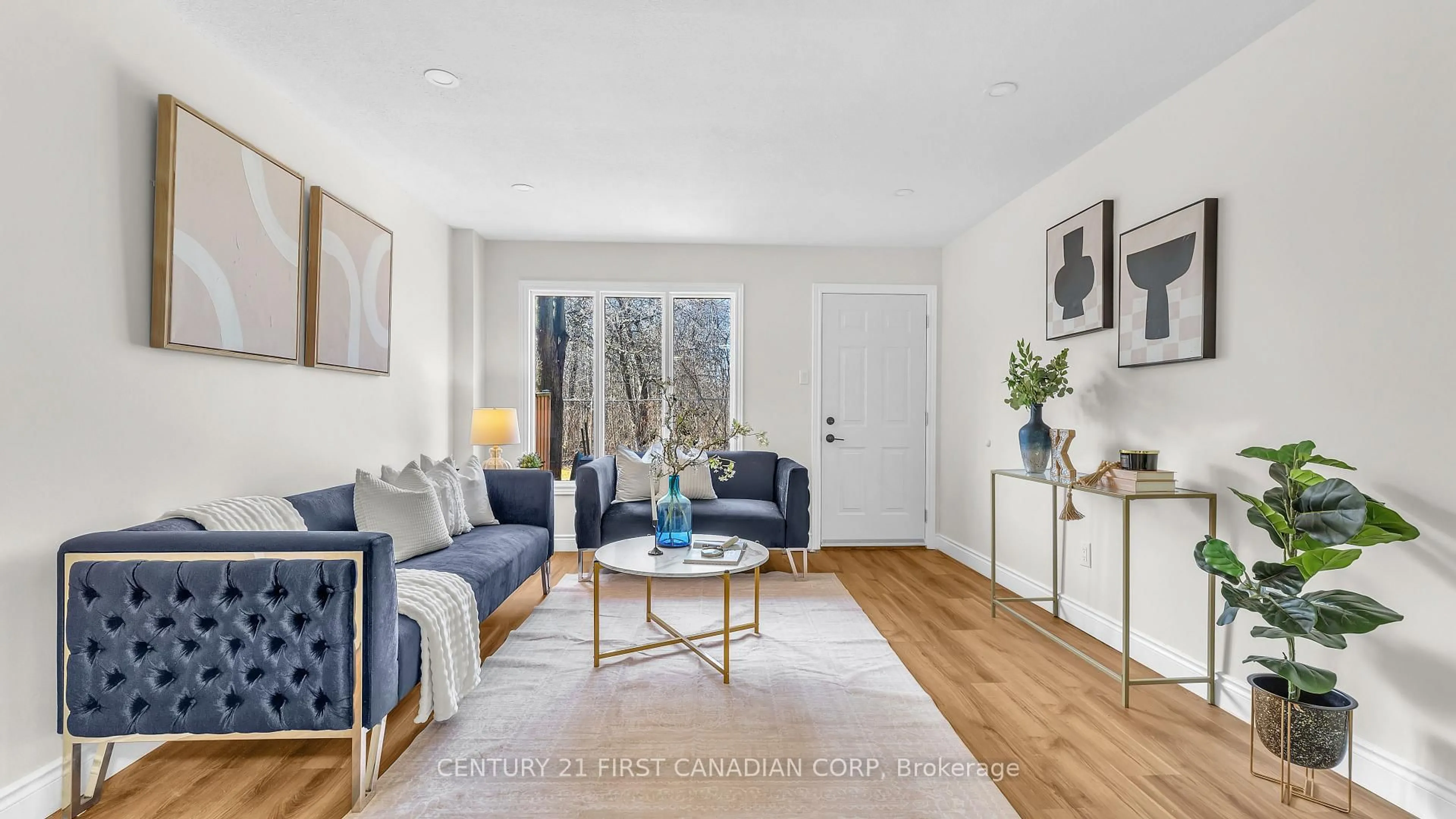 Living room with furniture, wood/laminate floor for 209 Millbank Dr #26, London South Ontario N6C 4V9