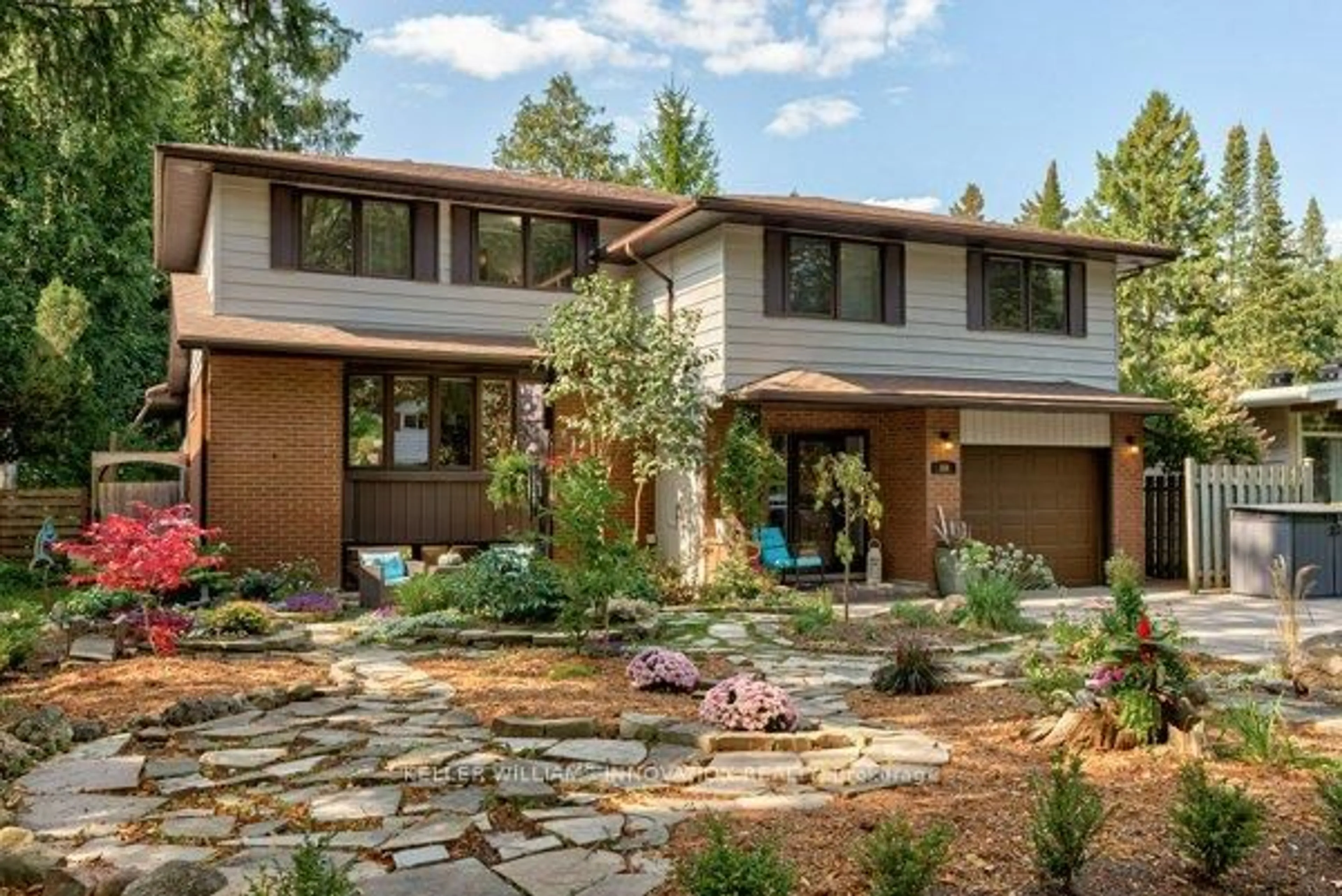 Home with brick exterior material, mountain view for 69 Longwood Dr, Waterloo Ontario N2L 4B6