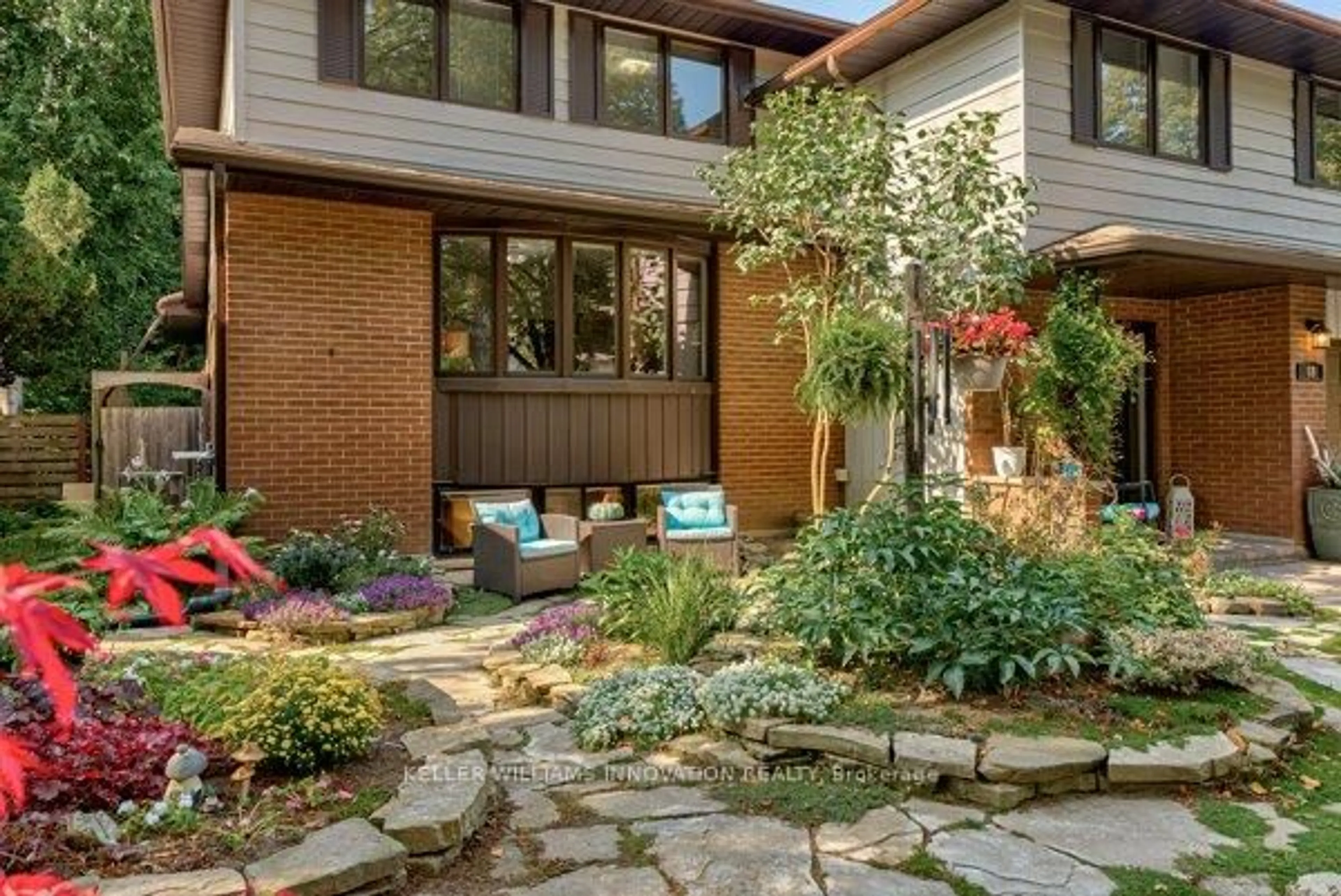 Home with brick exterior material, street for 69 Longwood Dr, Waterloo Ontario N2L 4B6