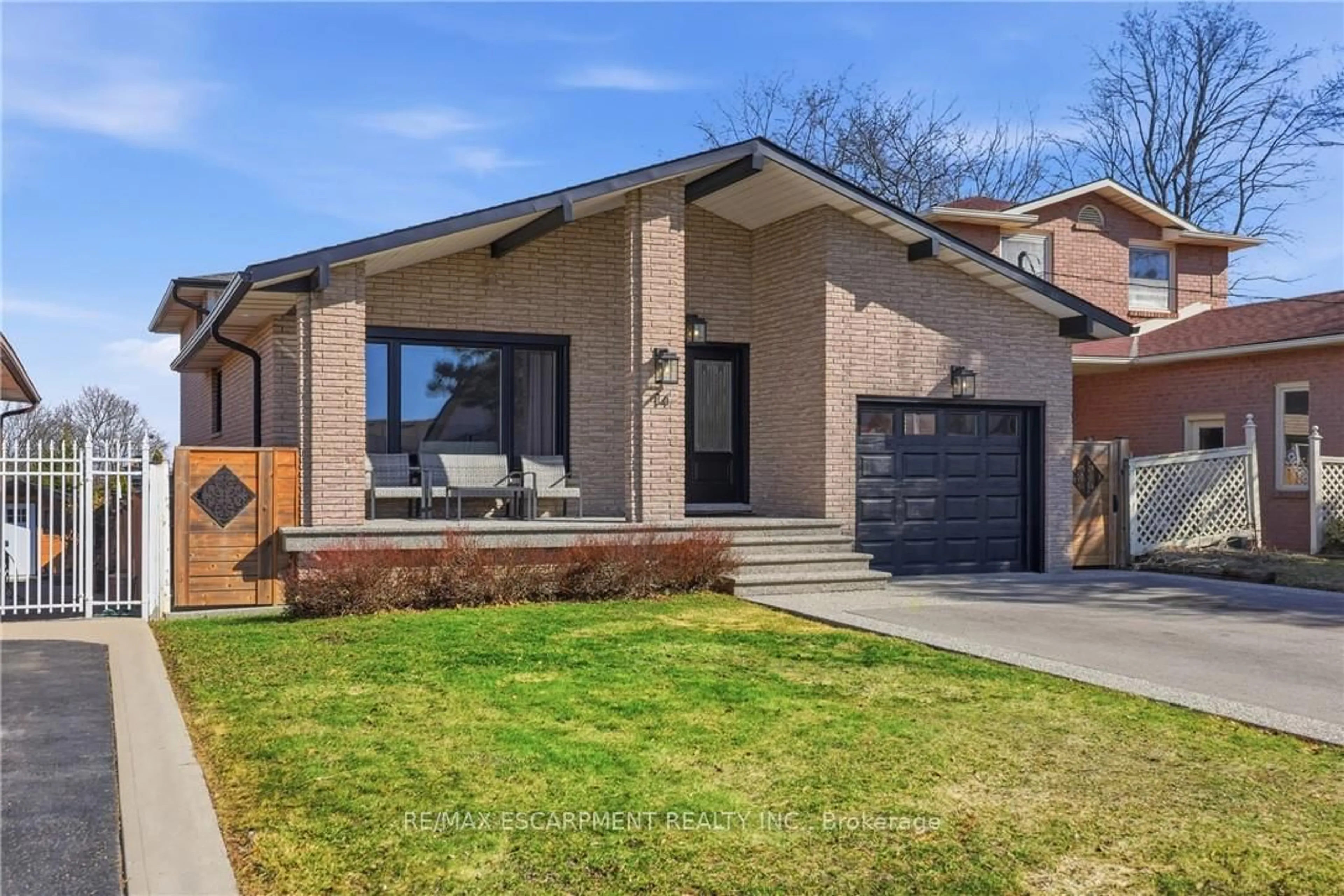 Home with brick exterior material, street for 14 ATKINS Dr, Hamilton Ontario L9C 6S1