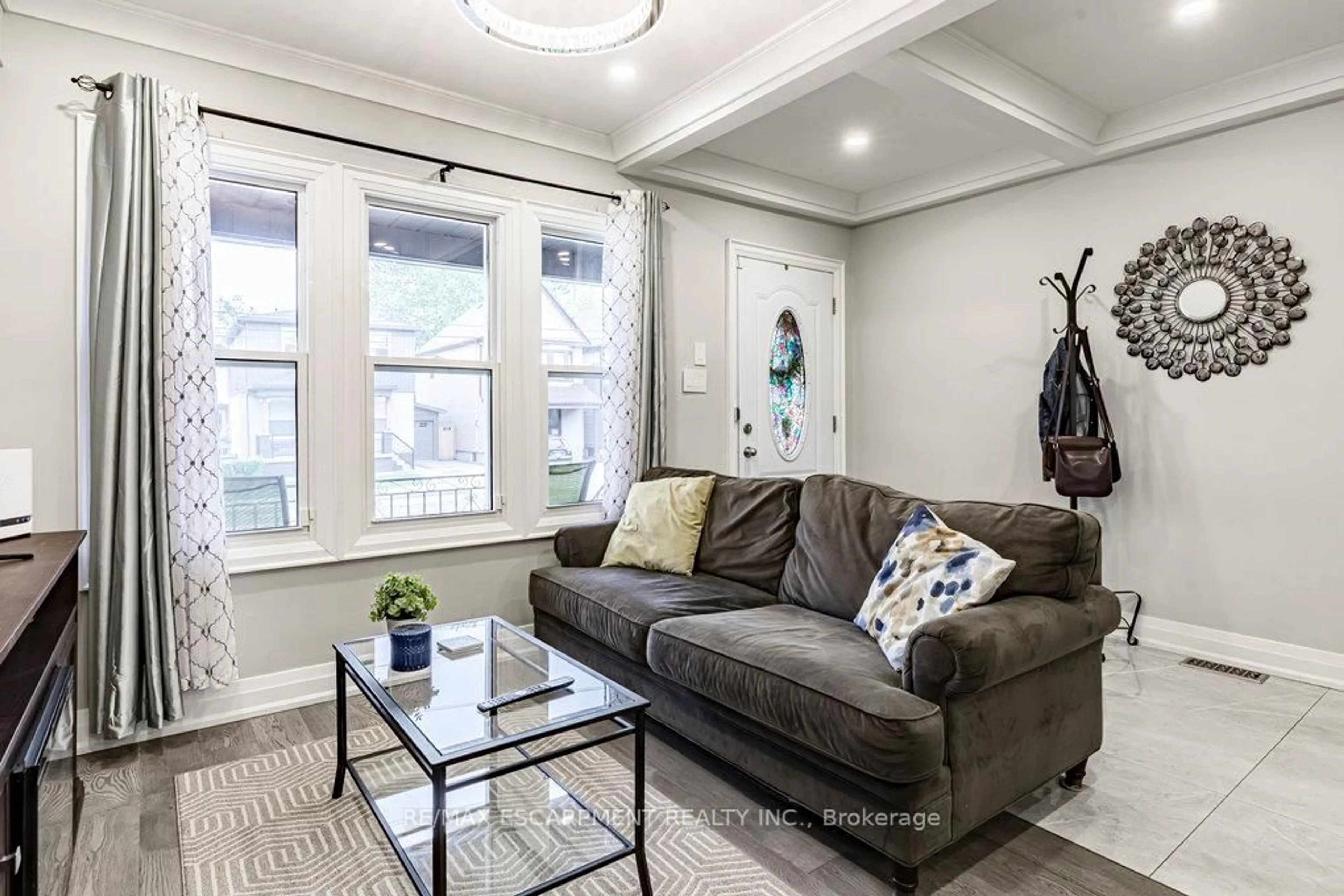 Living room with furniture, unknown for 67 Gage Ave, Hamilton Ontario L8L 6Z8