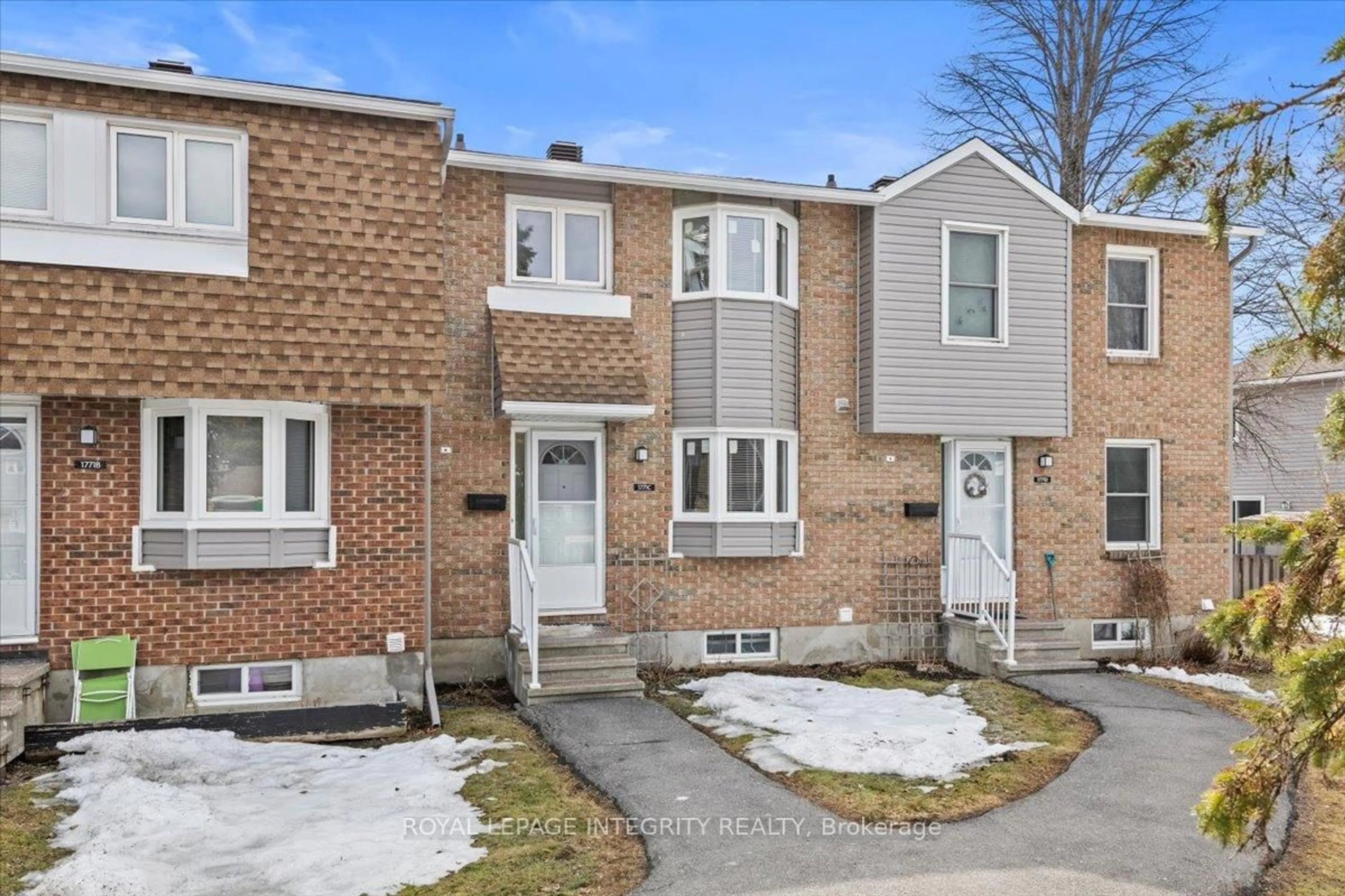 Home with brick exterior material, street for 1771 Lamoureux Dr #C, Ottawa Ontario K1E 2N5