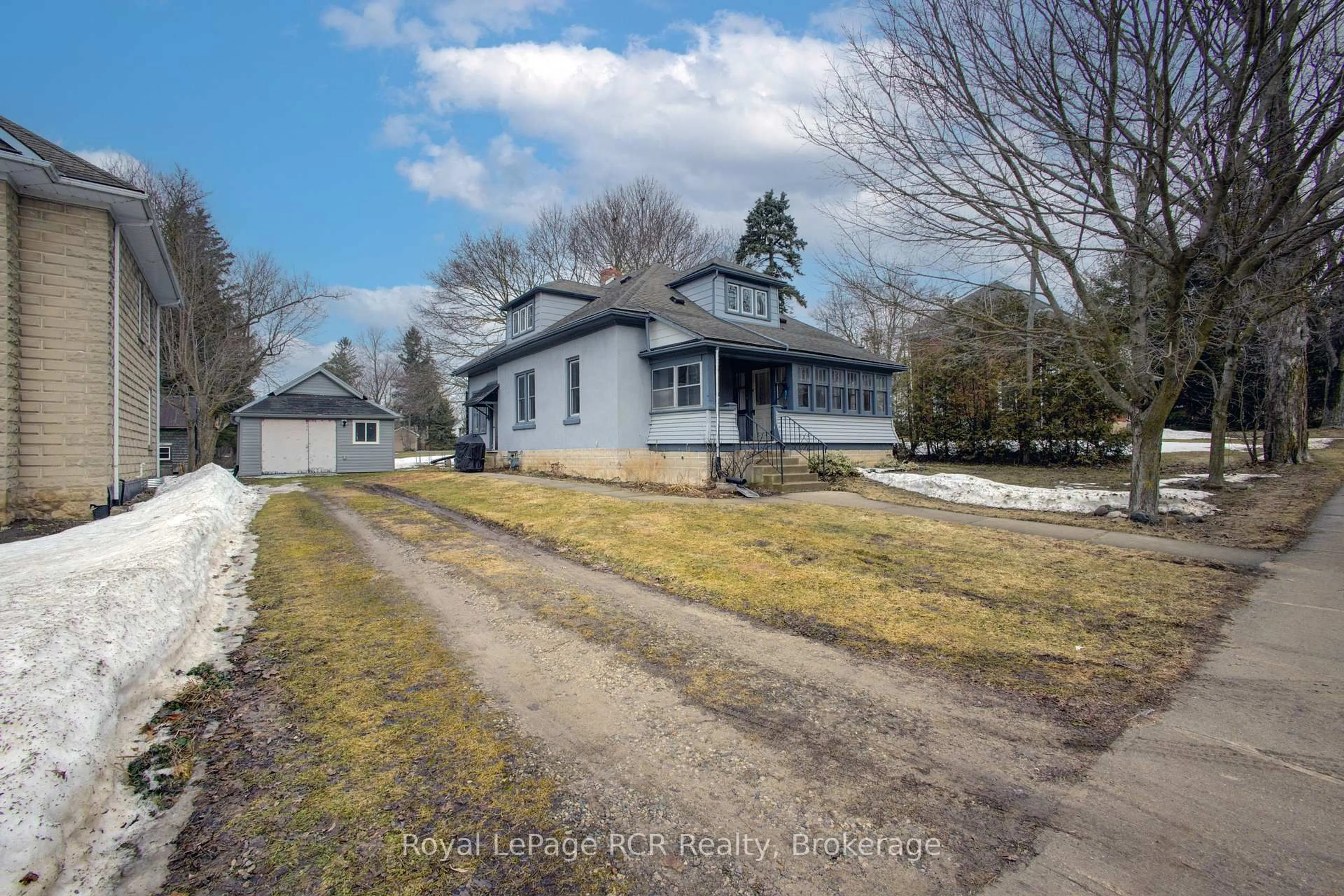 A pic from outside/outdoor area/front of a property/back of a property/a pic from drone, street for 161 Tucker St, Wellington North Ontario N0G 1A0