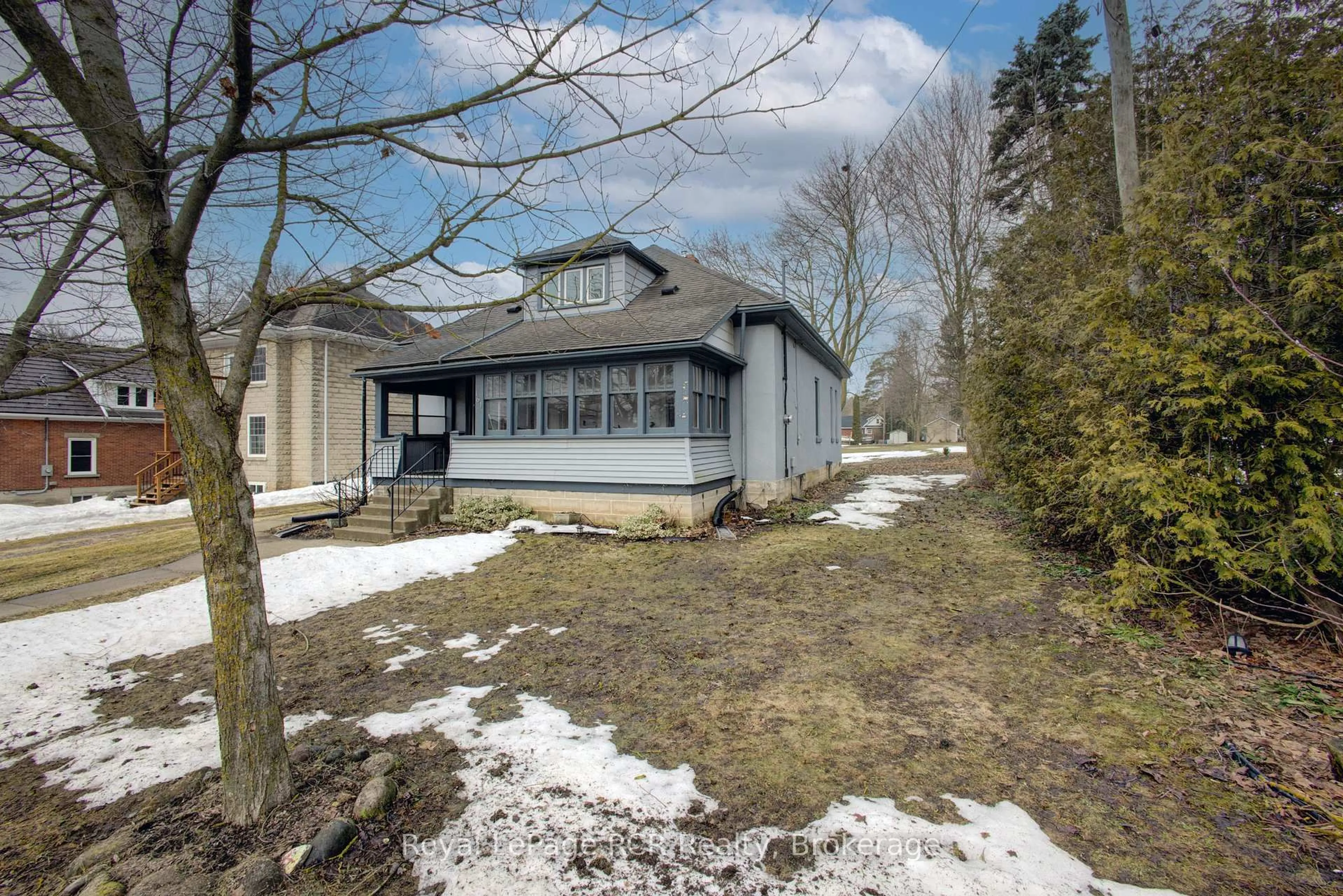 A pic from outside/outdoor area/front of a property/back of a property/a pic from drone, street for 161 Tucker St, Wellington North Ontario N0G 1A0