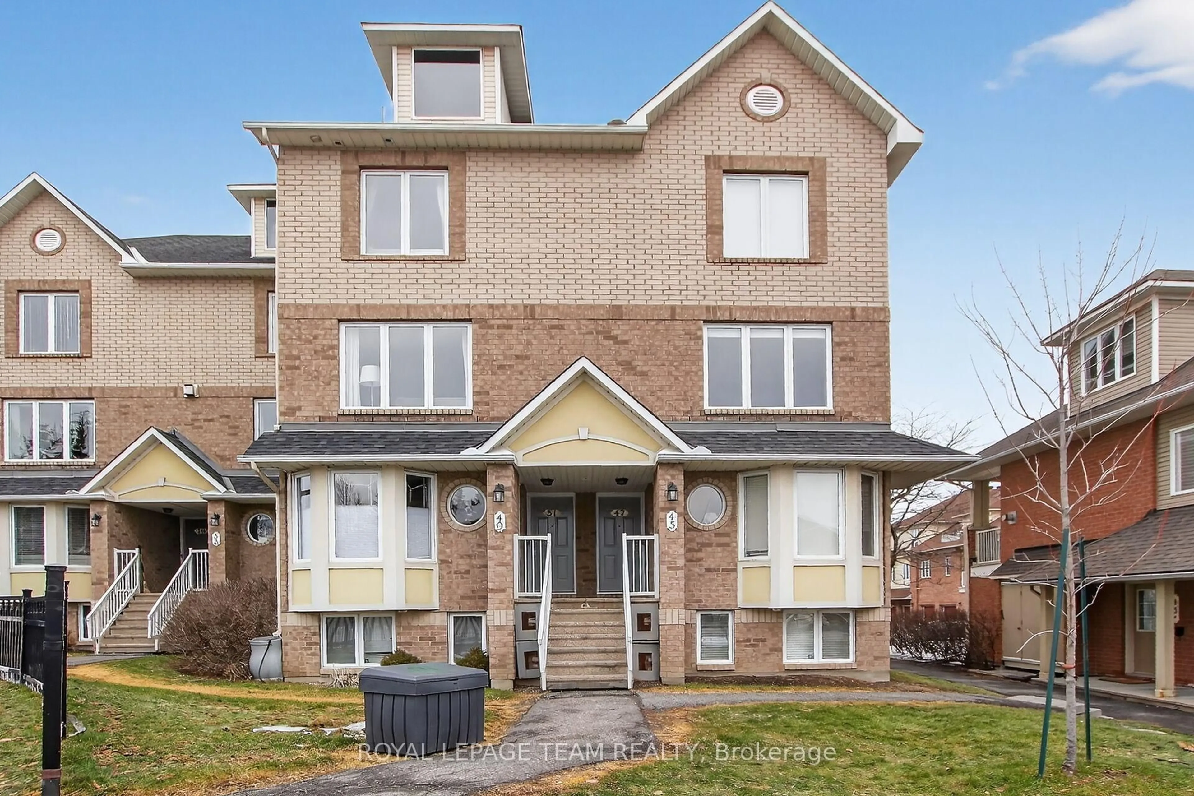 Home with brick exterior material, street for 51 Waterbridge Dr #15, Ottawa Ontario K2G 6T9