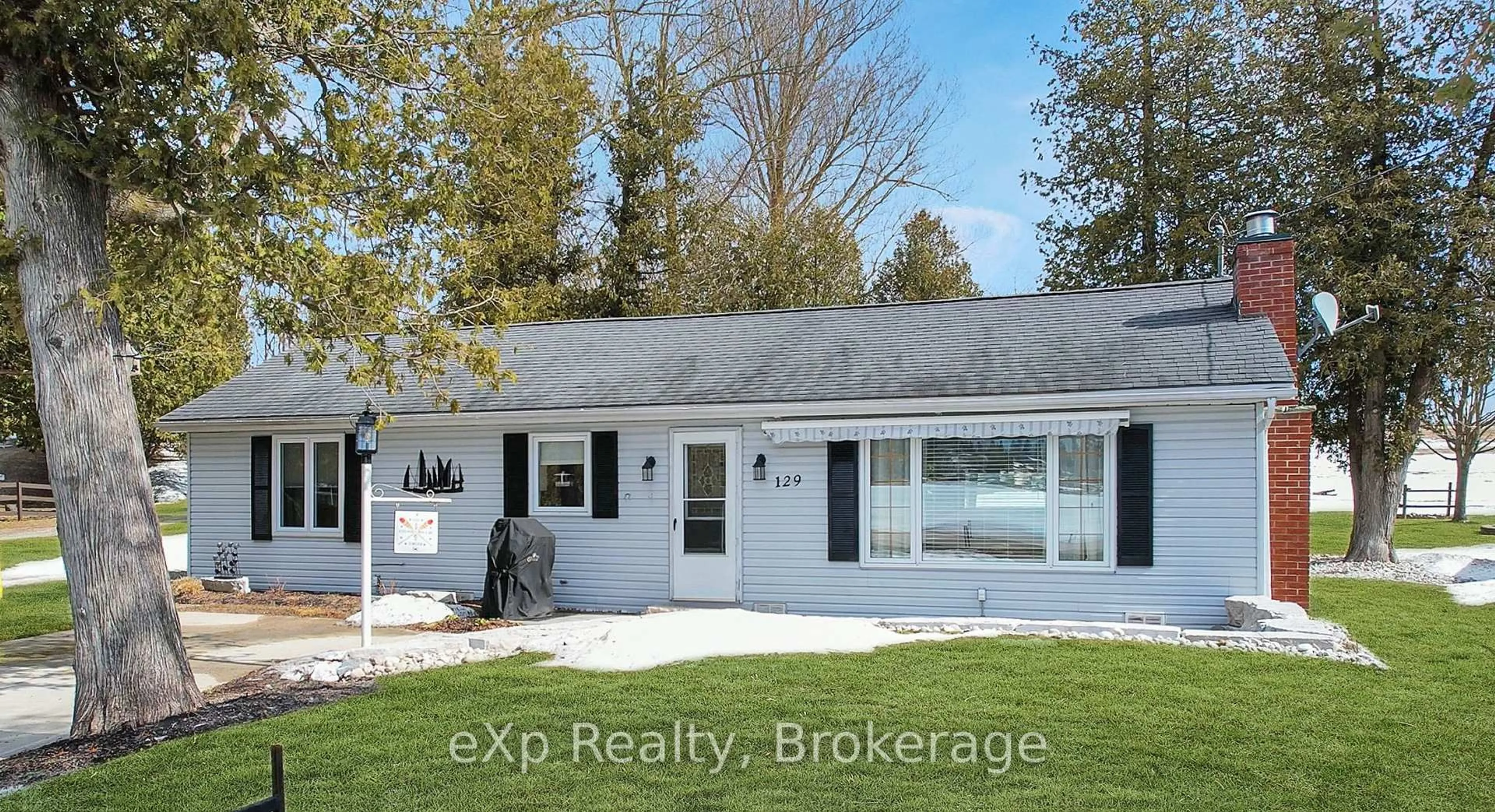 Home with vinyl exterior material, street for 129 Lake Rosalind Road 1, Brockton Ontario N4N 3B9