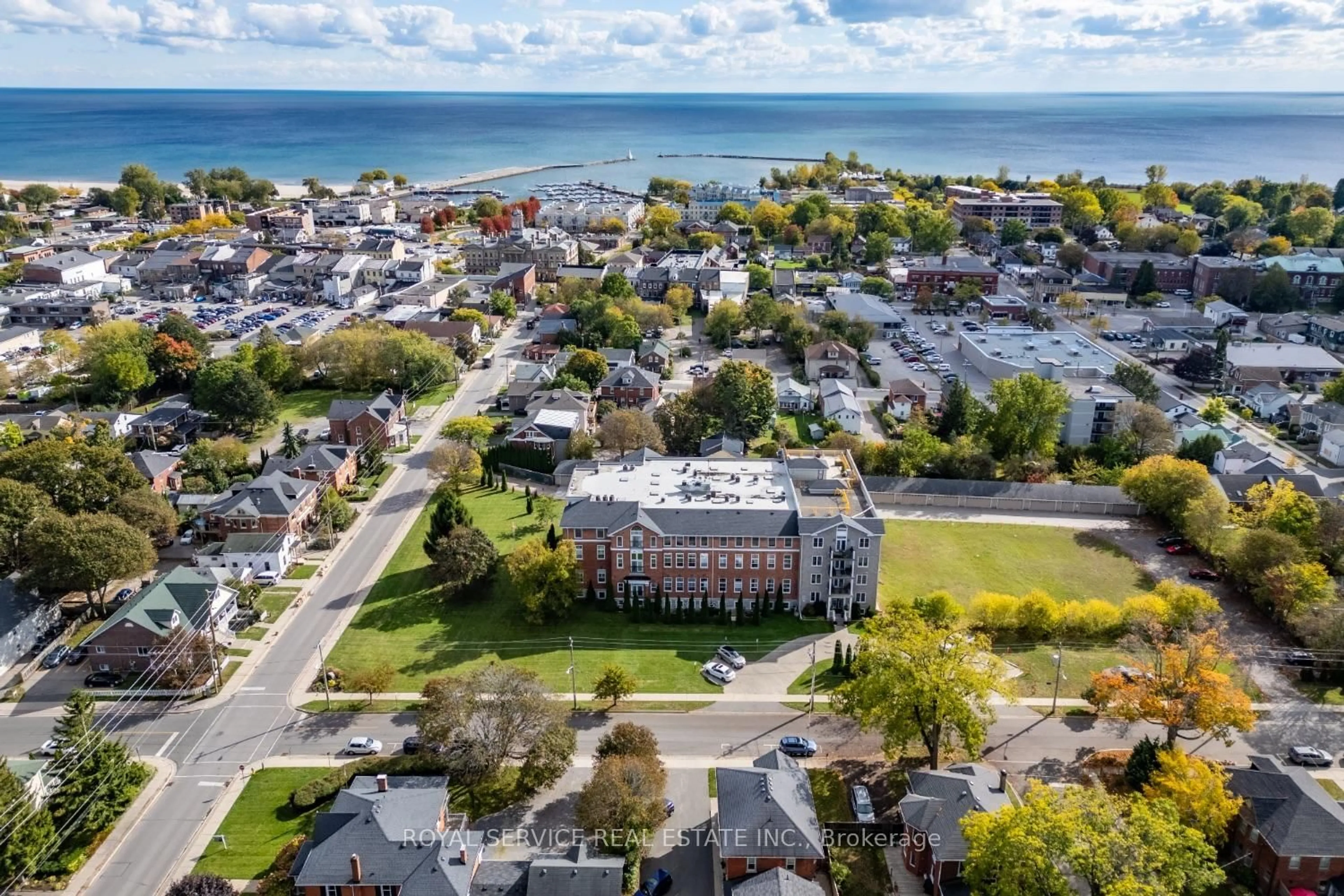 A pic from outside/outdoor area/front of a property/back of a property/a pic from drone, street for 323 George St #103, Cobourg Ontario K9A 3L9