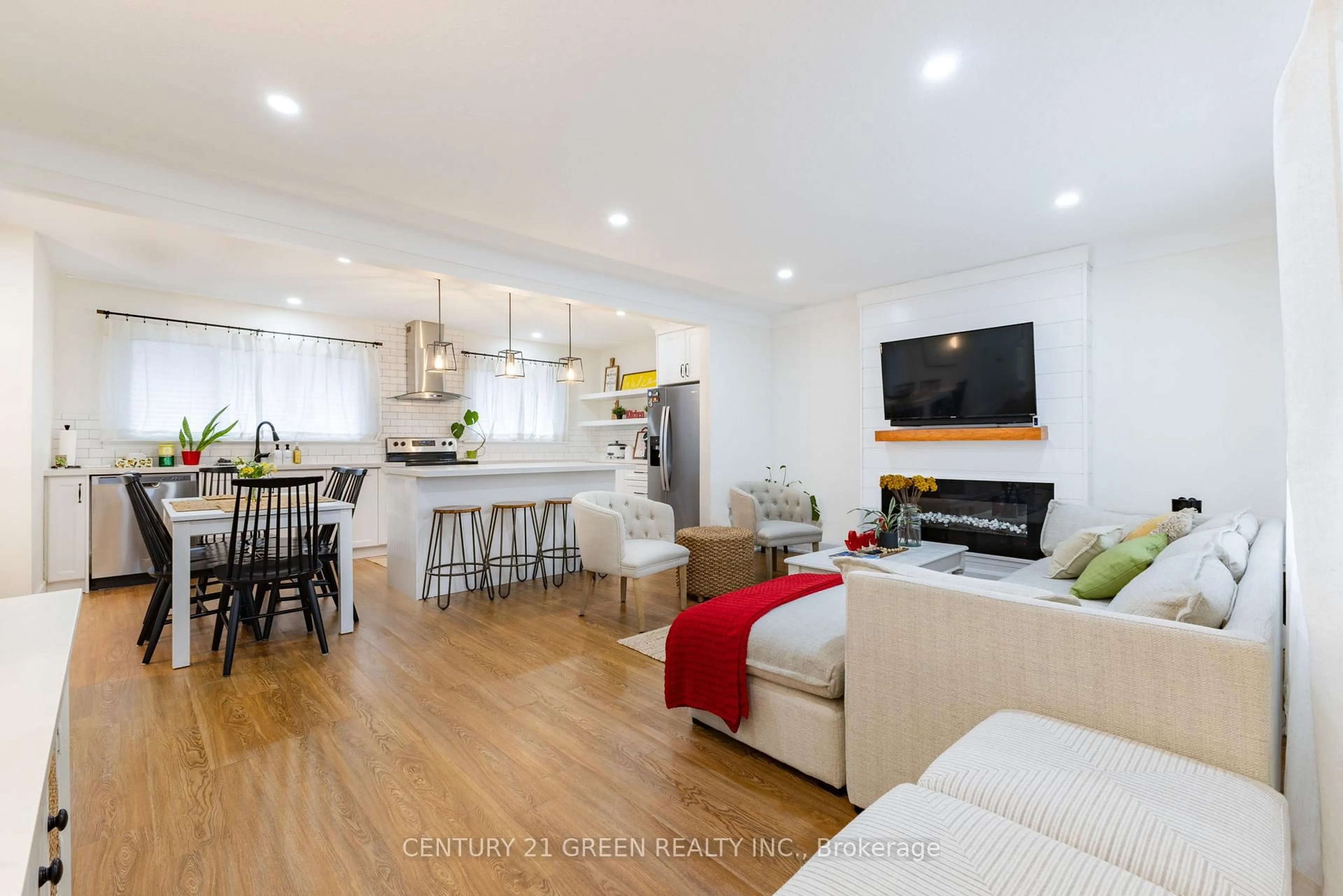 Open concept kitchen, wood/laminate floor for 6558 Huggins St, Niagara Falls Ontario L2J 1H4