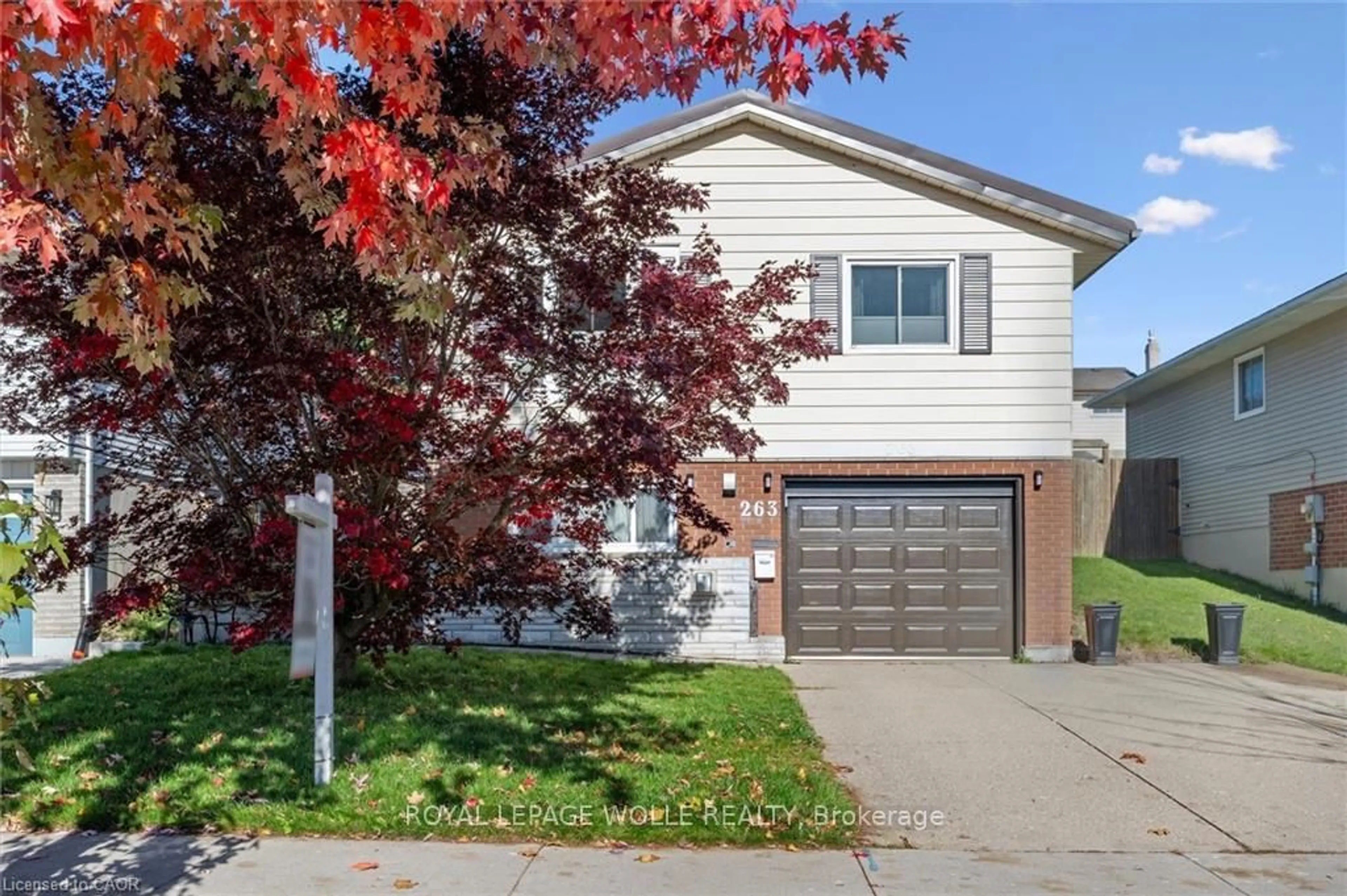 Home with vinyl exterior material, street for 263 The Country Way, Kitchener Ontario N2E 2V6