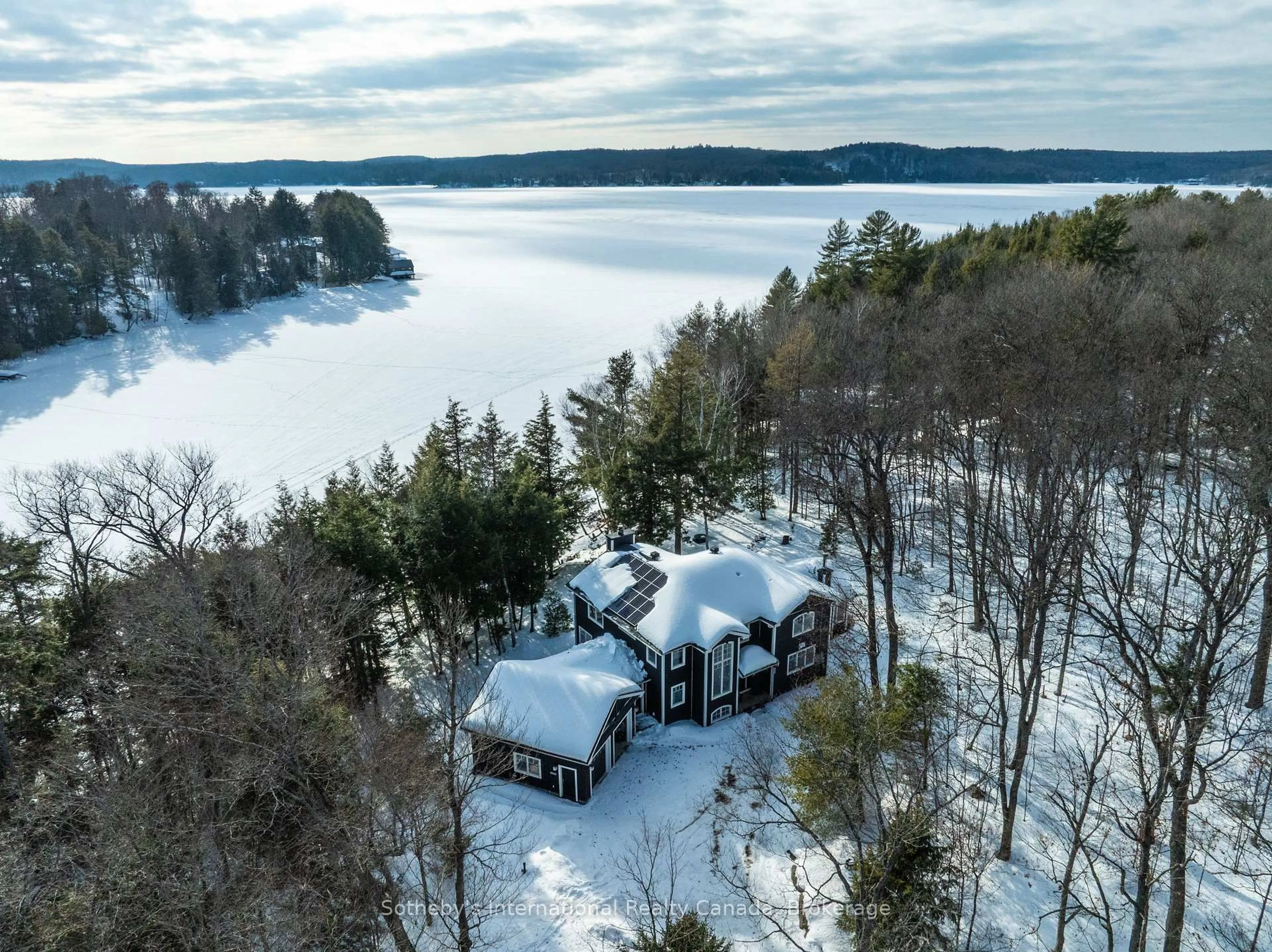 A pic from outside/outdoor area/front of a property/back of a property/a pic from drone, water/lake/river/ocean view for 1025 Long Point Rd, Lake of Bays Ontario P0A 1H0