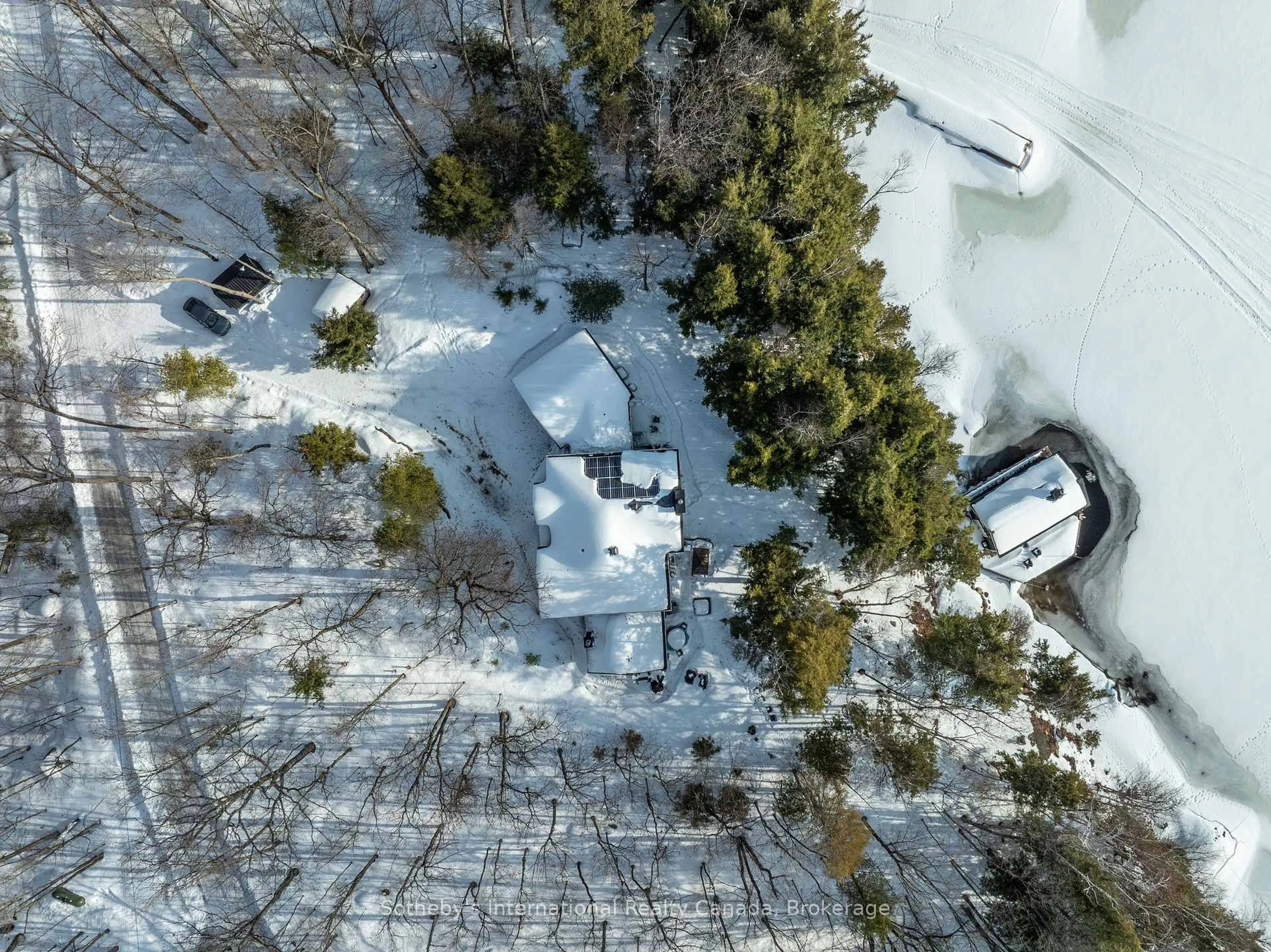 A pic from outside/outdoor area/front of a property/back of a property/a pic from drone, street for 1025 Long Point Rd, Lake of Bays Ontario P0A 1H0
