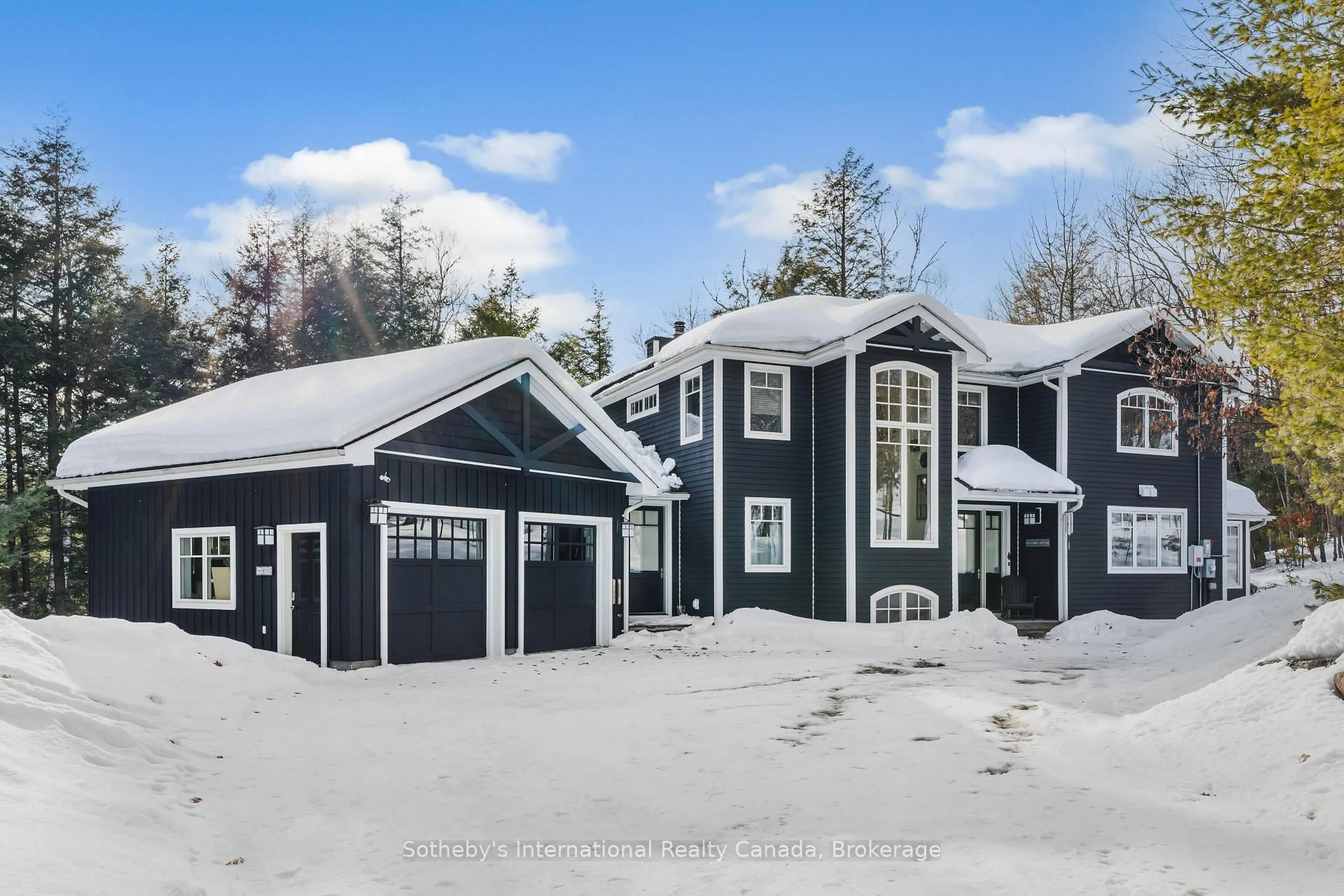 A pic from outside/outdoor area/front of a property/back of a property/a pic from drone, street for 1025 Long Point Rd, Lake of Bays Ontario P0A 1H0