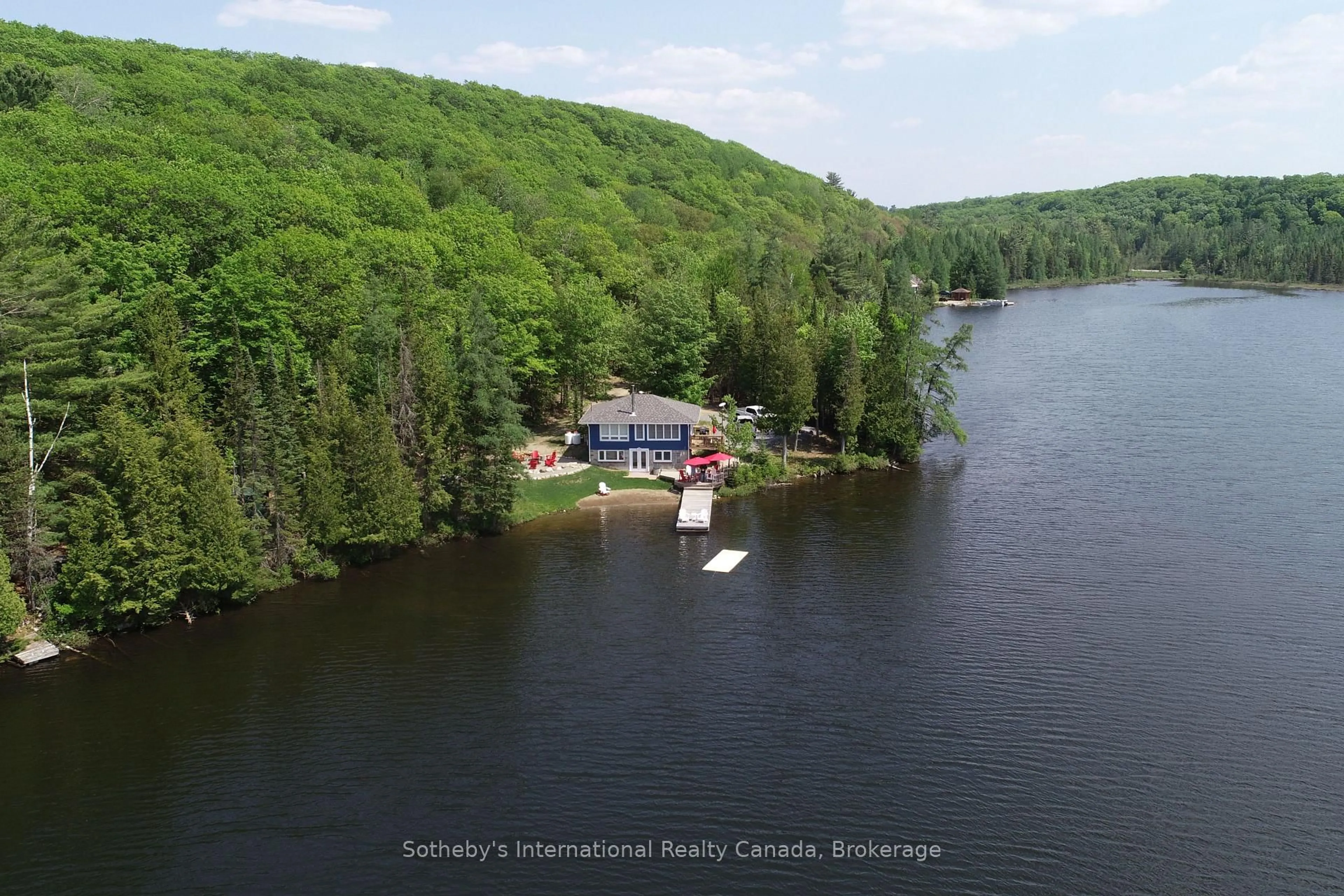 A pic from outside/outdoor area/front of a property/back of a property/a pic from drone, water/lake/river/ocean view for 138 Jenkins Lane, Perry Ontario P0A 1R0