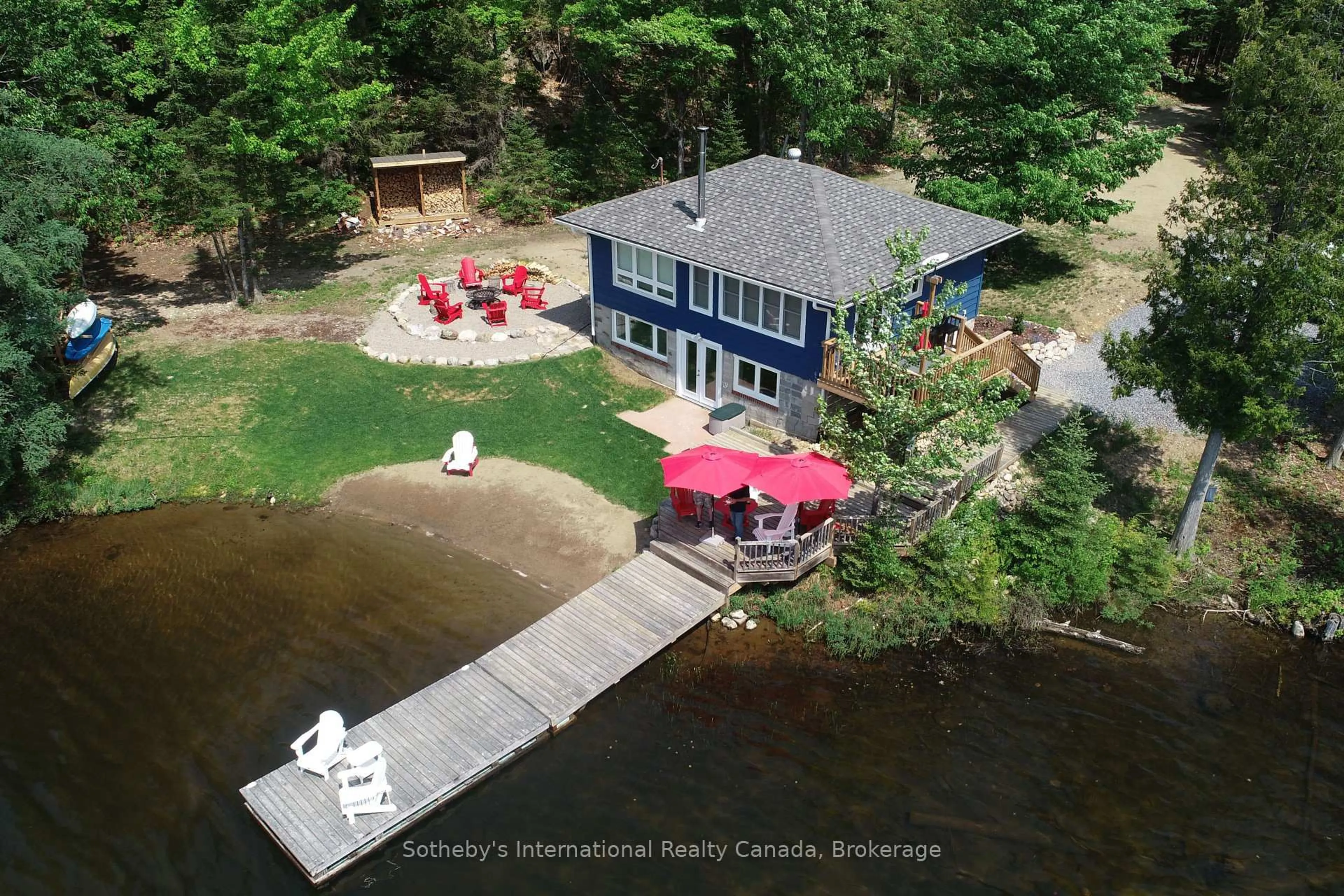 A pic from outside/outdoor area/front of a property/back of a property/a pic from drone, water/lake/river/ocean view for 138 Jenkins Lane, Perry Ontario P0A 1R0