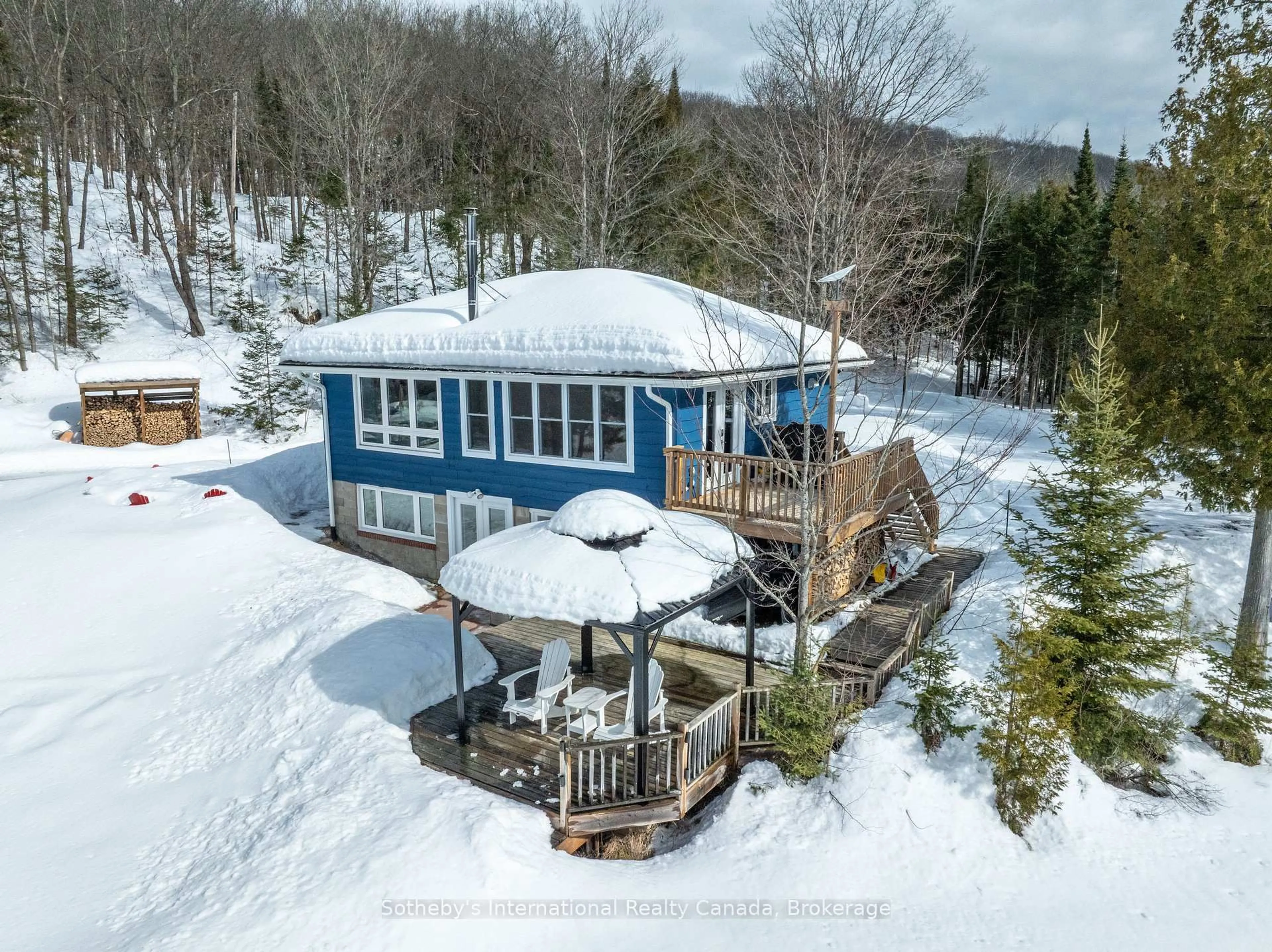 A pic from outside/outdoor area/front of a property/back of a property/a pic from drone, water/lake/river/ocean view for 138 Jenkins Lane, Perry Ontario P0A 1R0