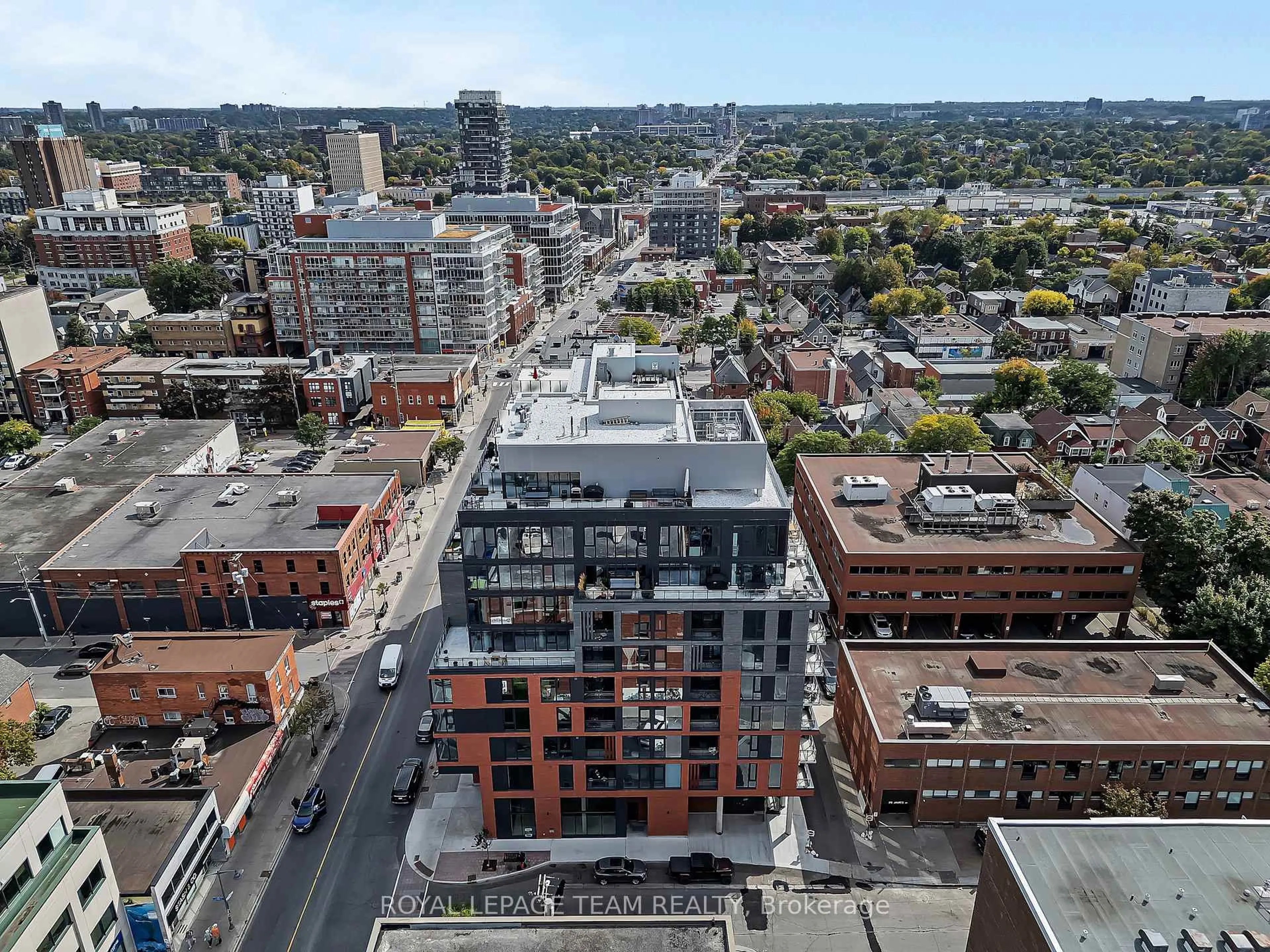 A pic from outside/outdoor area/front of a property/back of a property/a pic from drone, city buildings view from balcony for 10 James St #210, Ottawa Ontario K2P 1T2