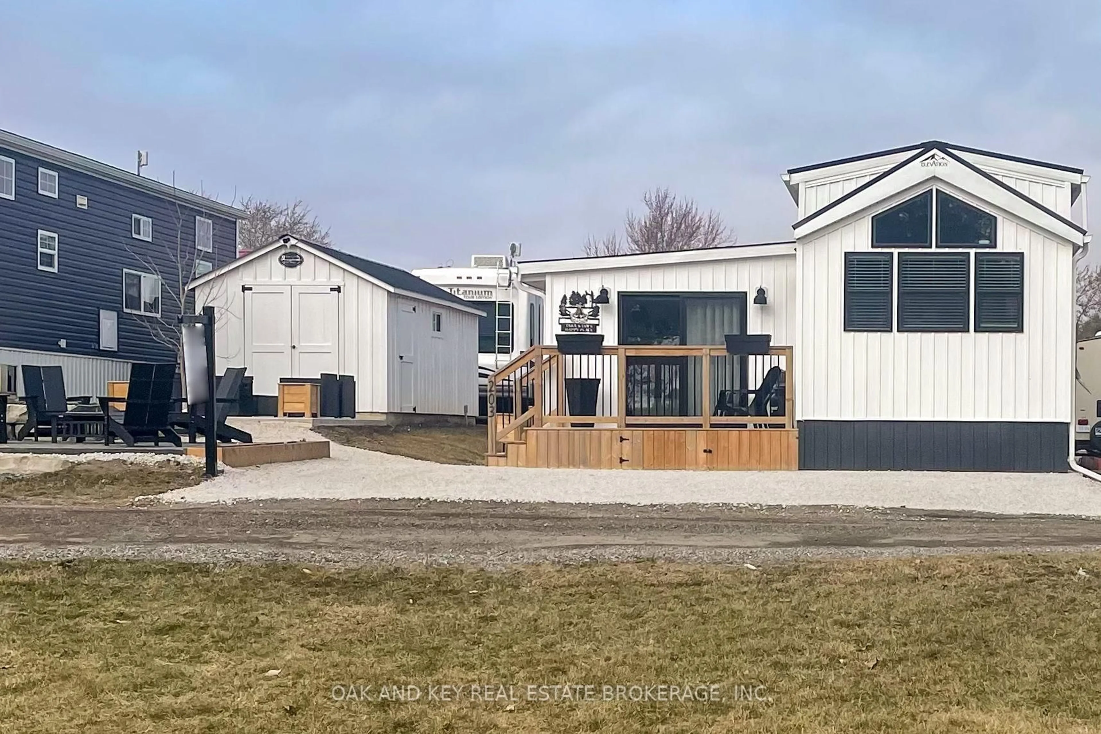 Home with vinyl exterior material, street for 4838 Switzer Dr #203, Southwest Middlesex Ontario N0L 1A0