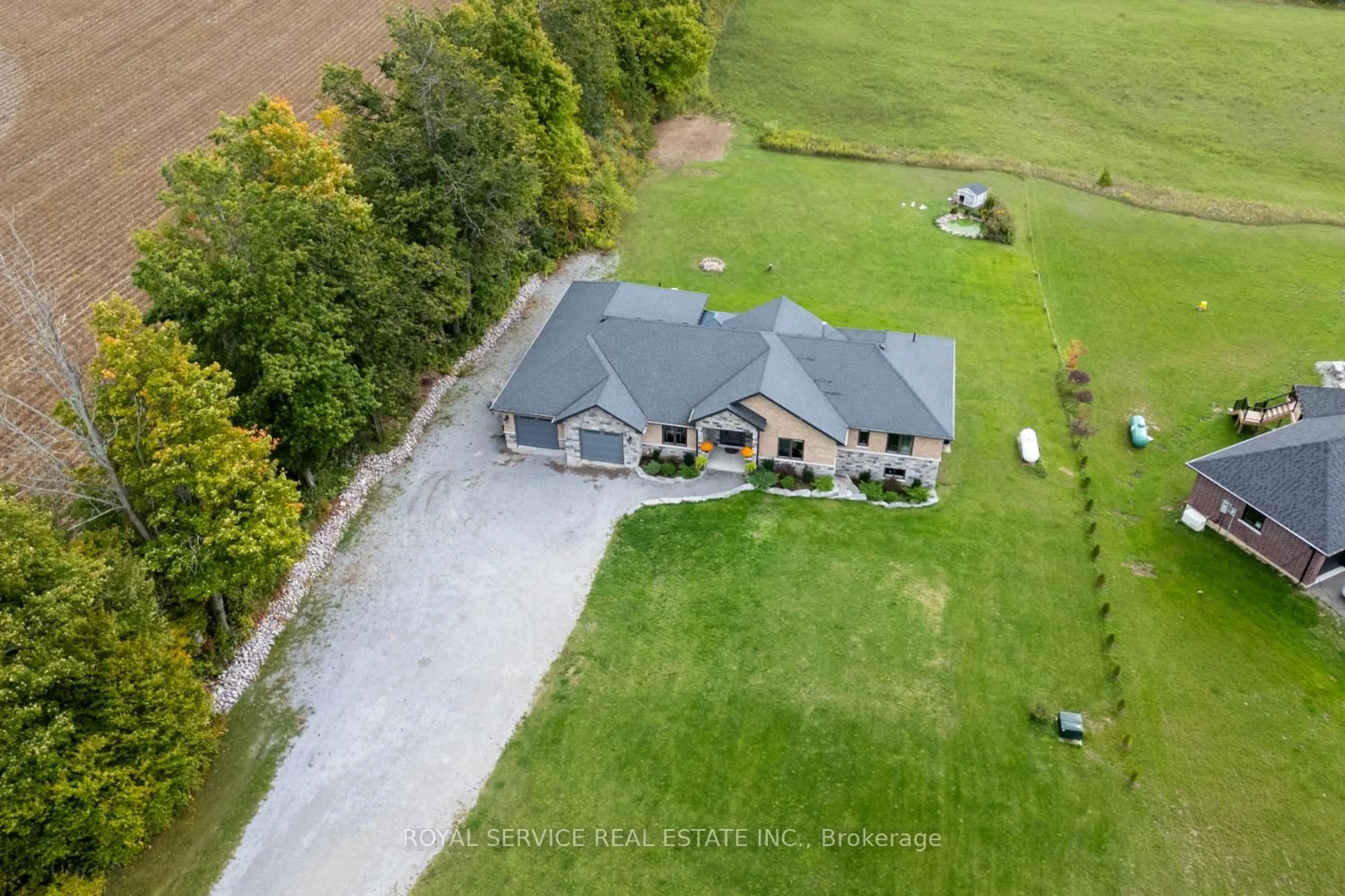A pic from outside/outdoor area/front of a property/back of a property/a pic from drone, unknown for 381 Sharpe Line, Cavan Monaghan Ontario L0A 1C0