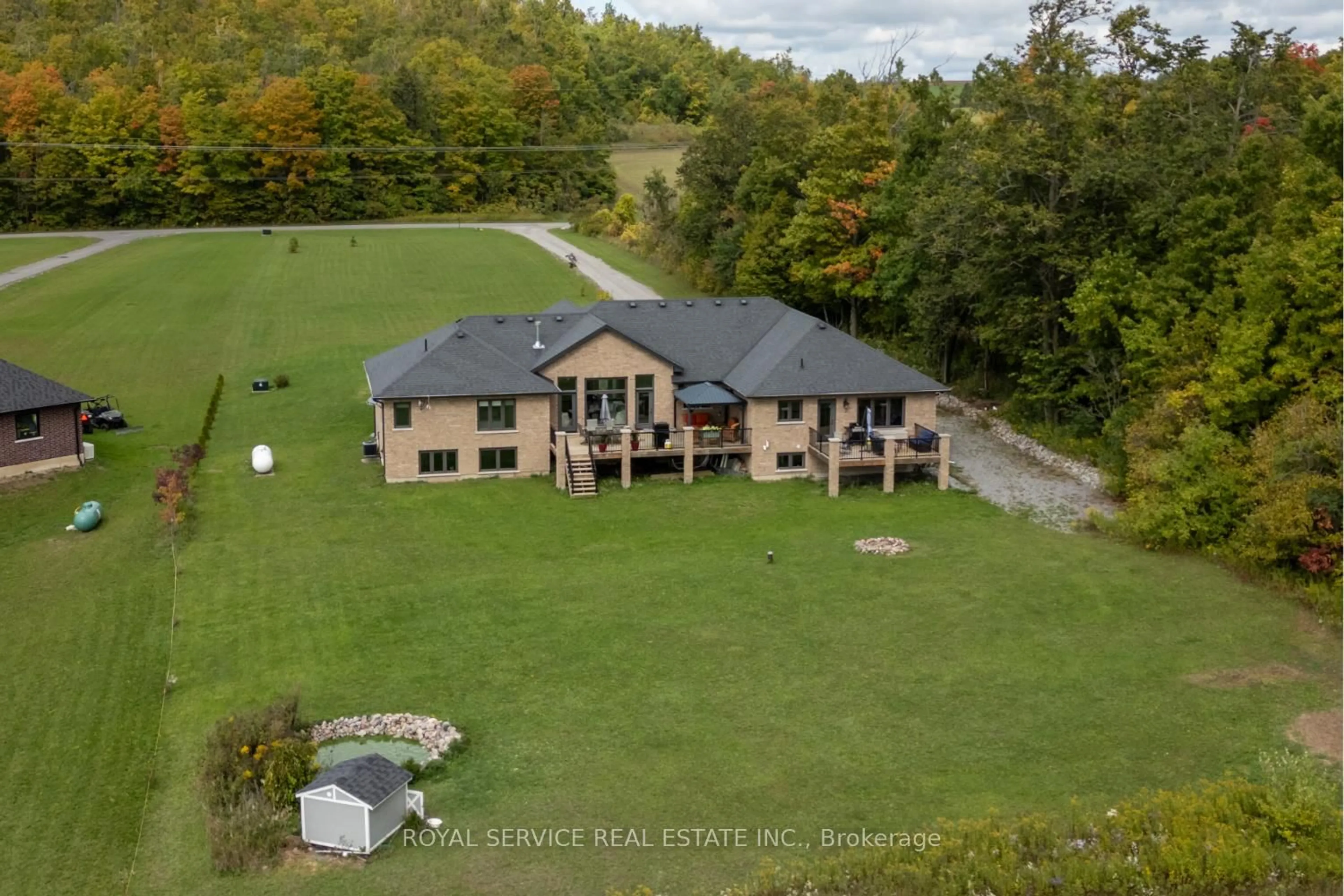A pic from outside/outdoor area/front of a property/back of a property/a pic from drone, water/lake/river/ocean view for 381 Sharpe Line, Cavan Monaghan Ontario L0A 1C0