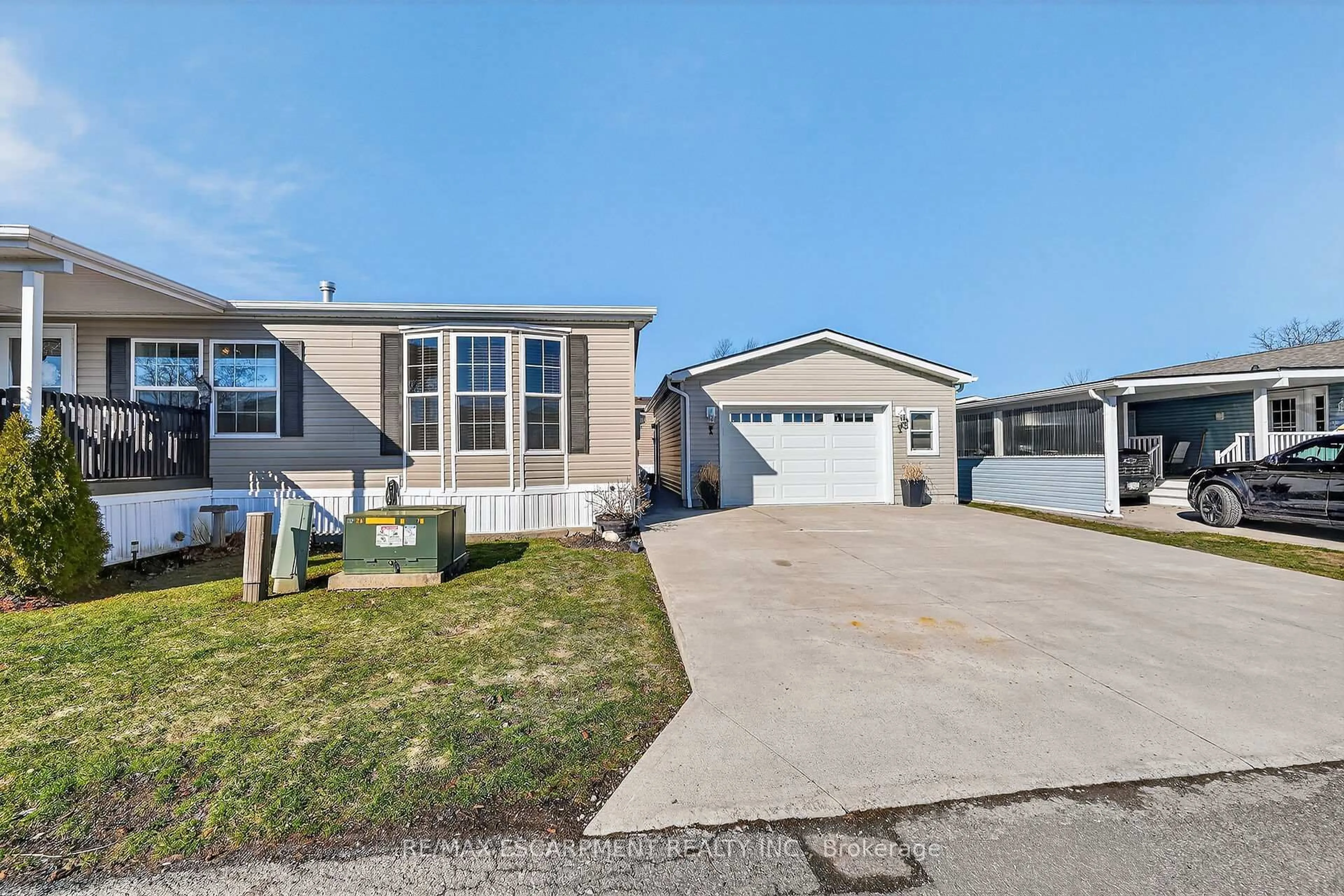 Home with vinyl exterior material, street for 3033 Townline Rd #211, Fort Erie Ontario L0S 1S1