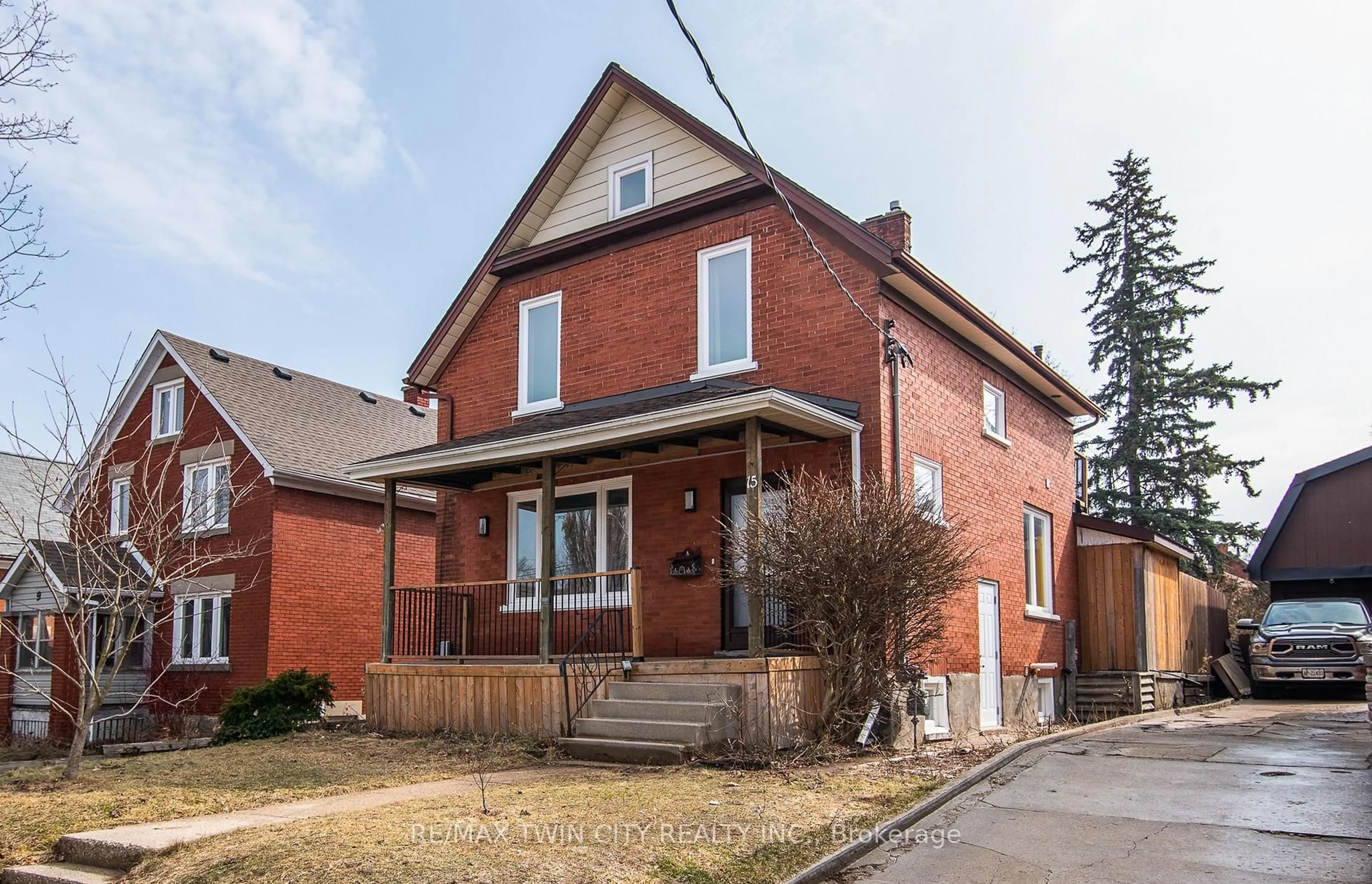 Home with brick exterior material, street for 15 Herlan Ave, Kitchener Ontario N2G 2C4