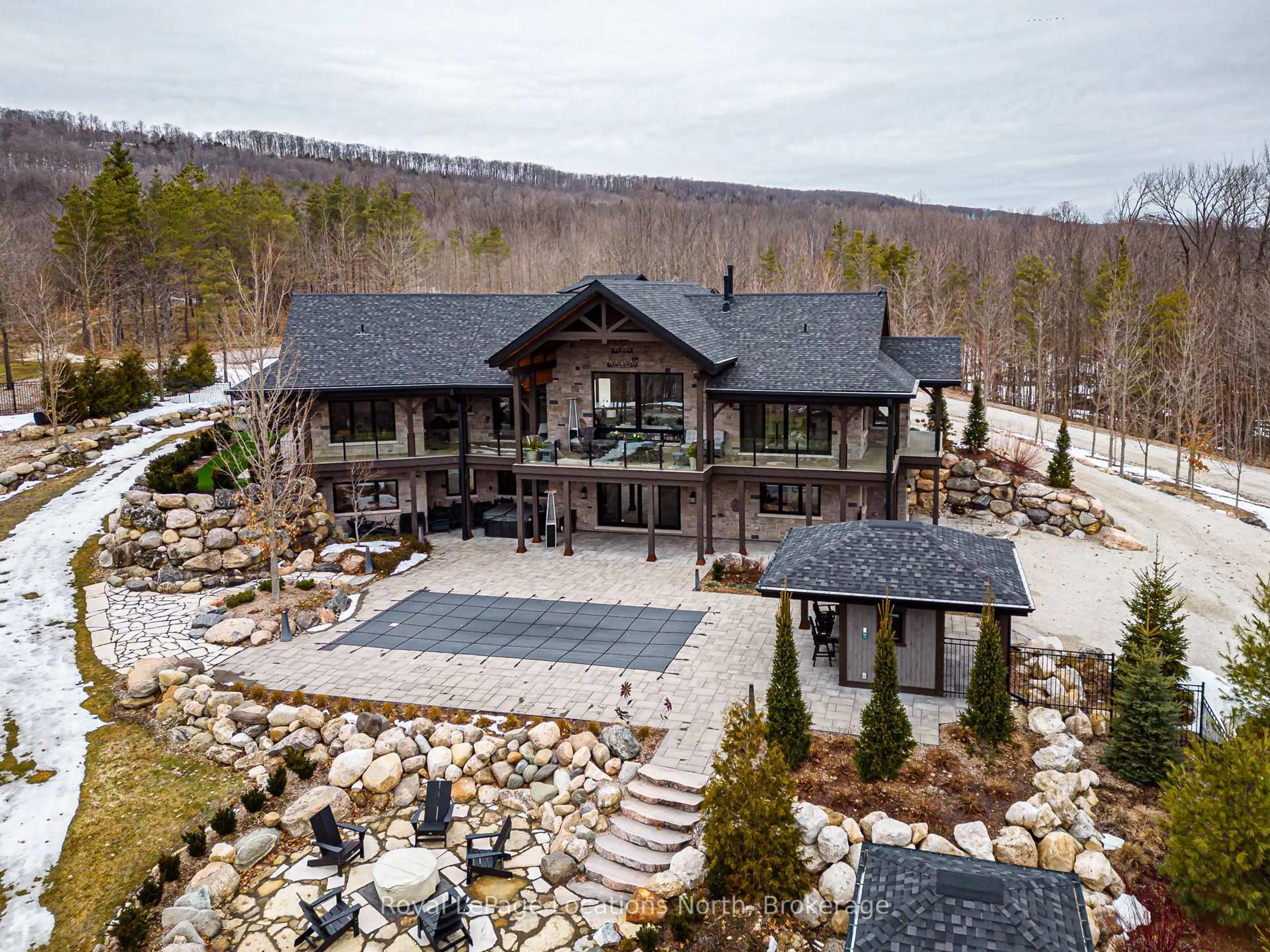 A pic from outside/outdoor area/front of a property/back of a property/a pic from drone, mountain view for 195718 Grey 7 Rd, Grey Highlands Ontario N0C 1G0