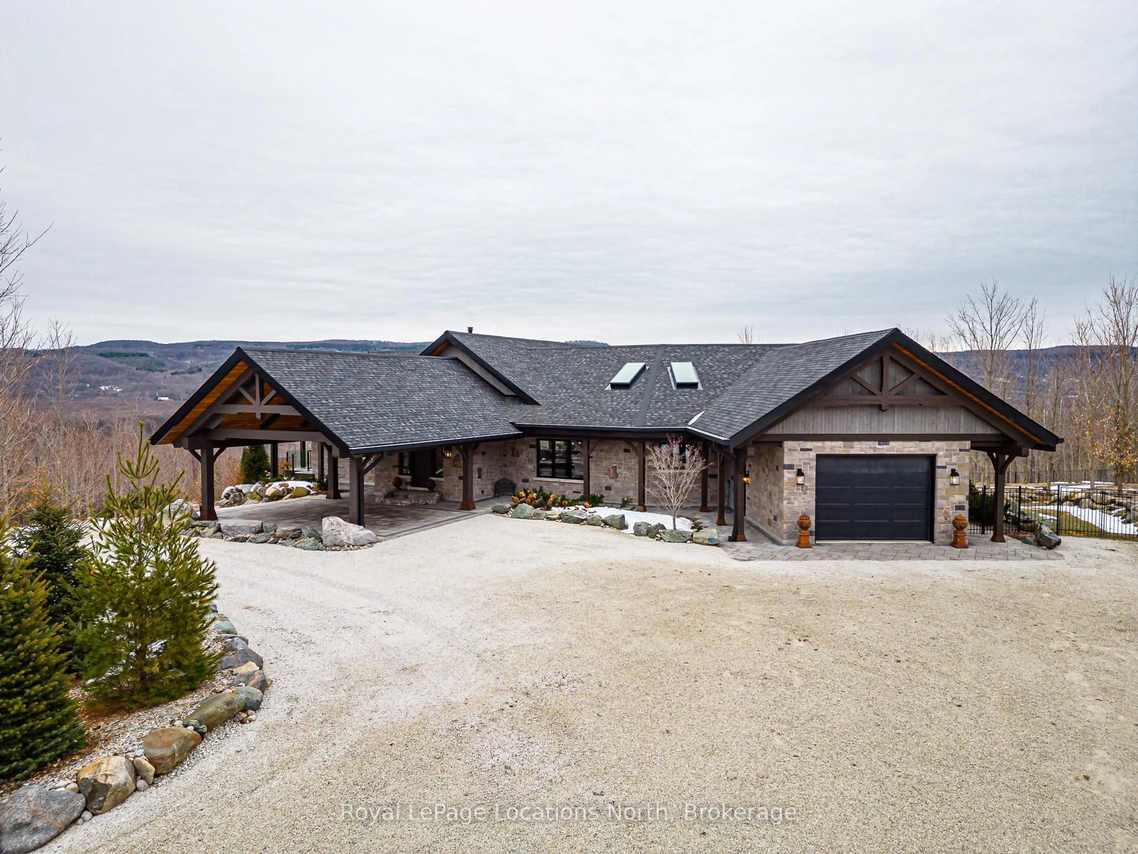 A pic from outside/outdoor area/front of a property/back of a property/a pic from drone, mountain view for 195718 Grey 7 Rd, Grey Highlands Ontario N0C 1G0
