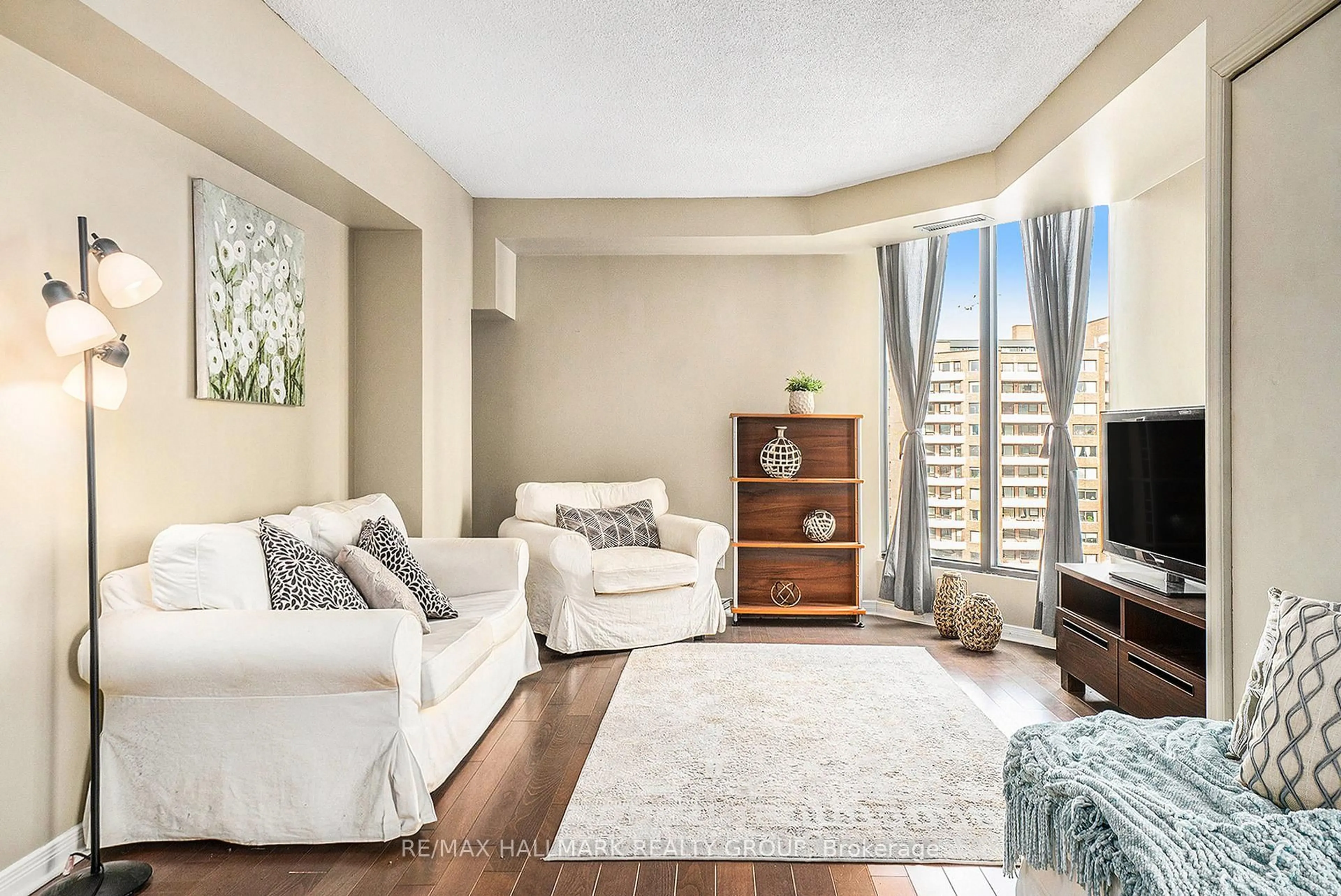 Living room with furniture, unknown for 200 Bay St #1102, Ottawa Ontario K1R 7W8