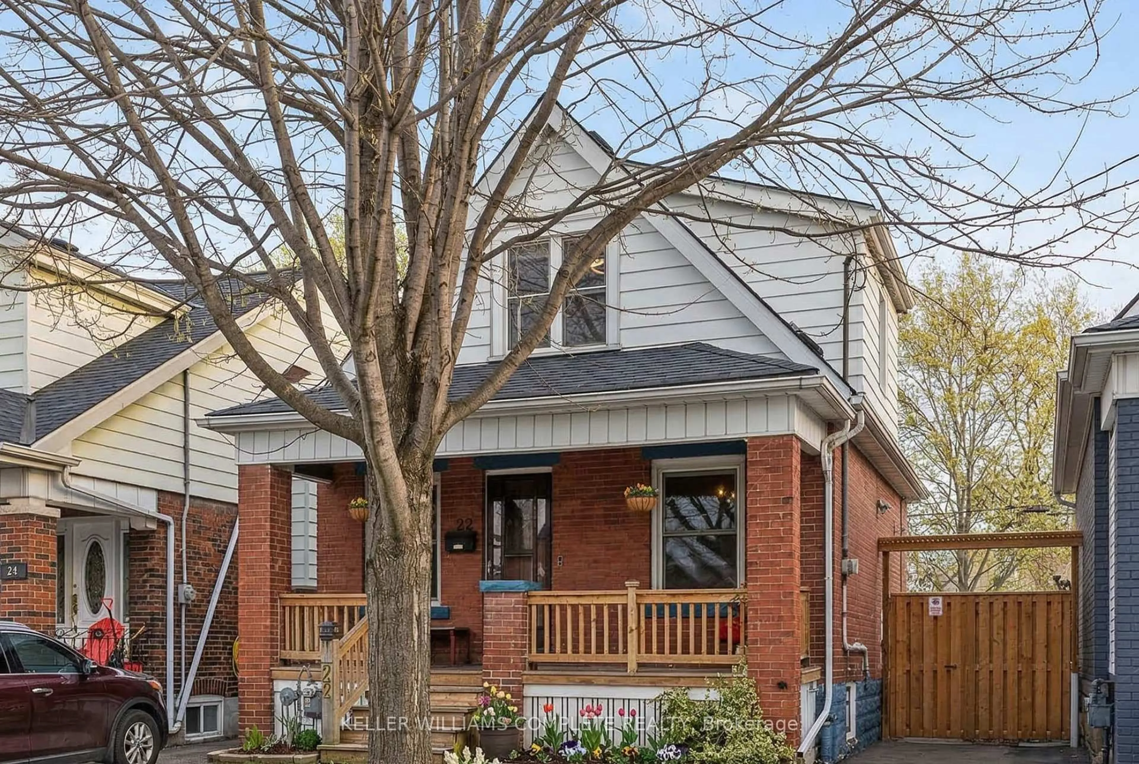 Home with brick exterior material, street for 22 COPE St, Hamilton Ontario L8H 5A9