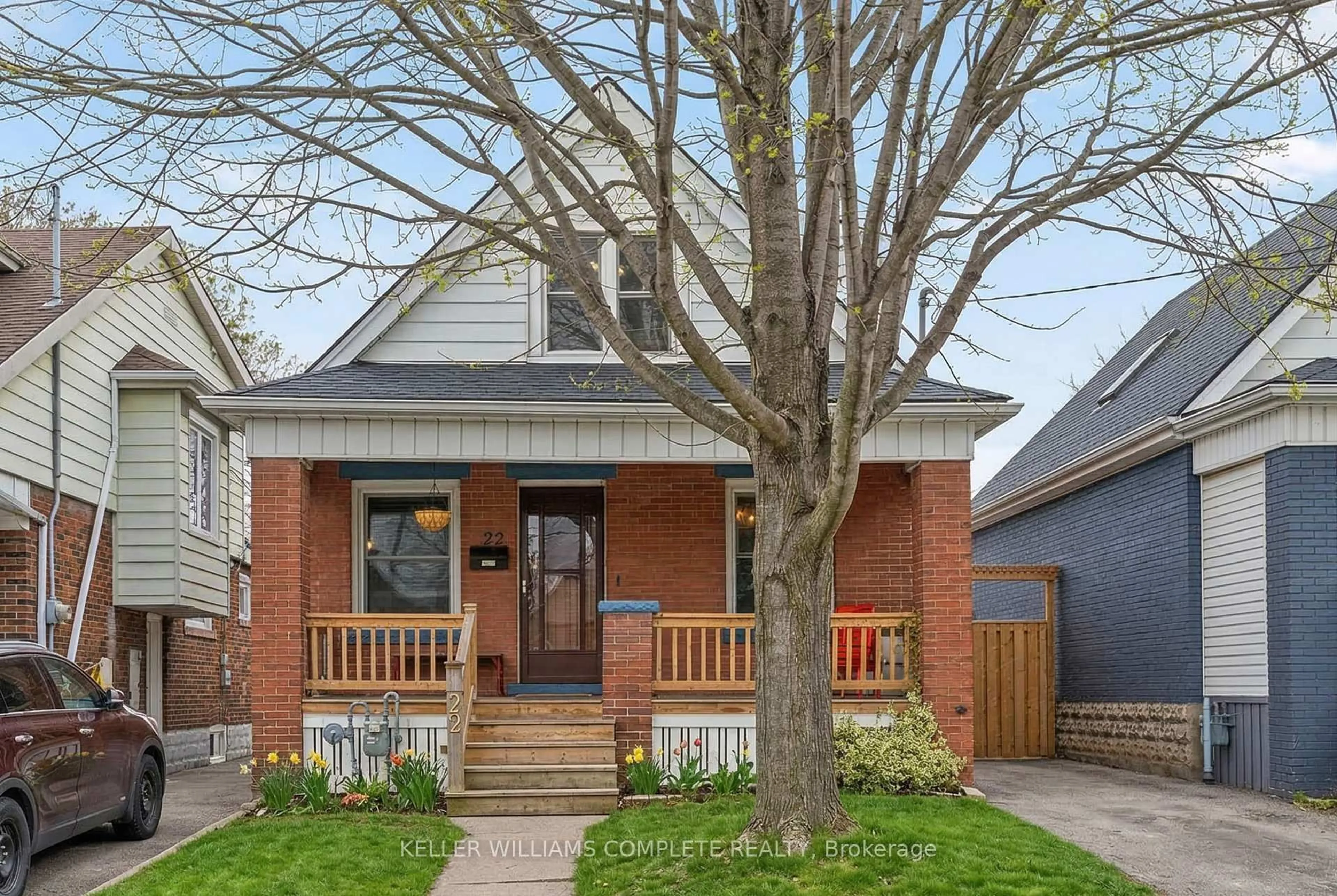 Home with brick exterior material, street for 22 COPE St, Hamilton Ontario L8H 5A9