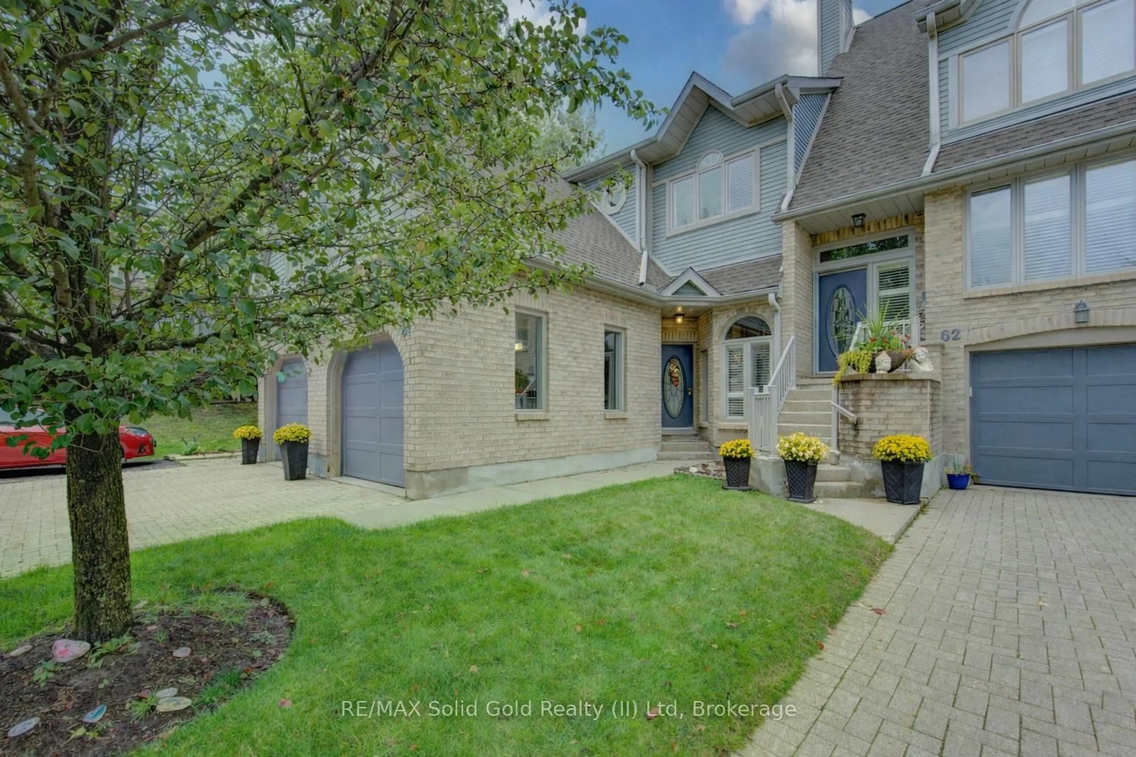 Home with brick exterior material, street for 225 Benjamin Rd #61, Waterloo Ontario N2V 1Z3