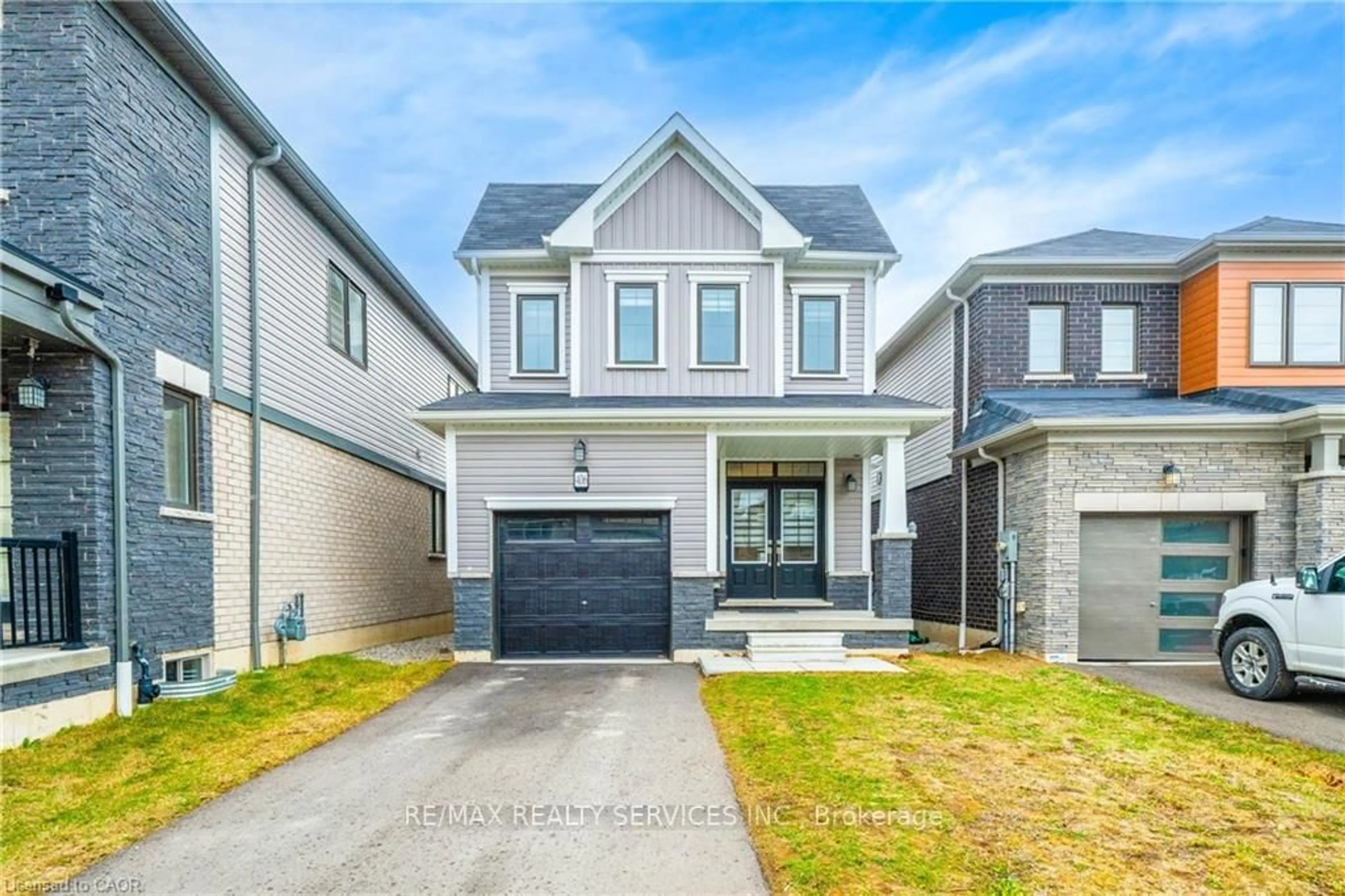 Home with brick exterior material, street for 406 Dolman St, Woolwich Ontario N0B 1M0