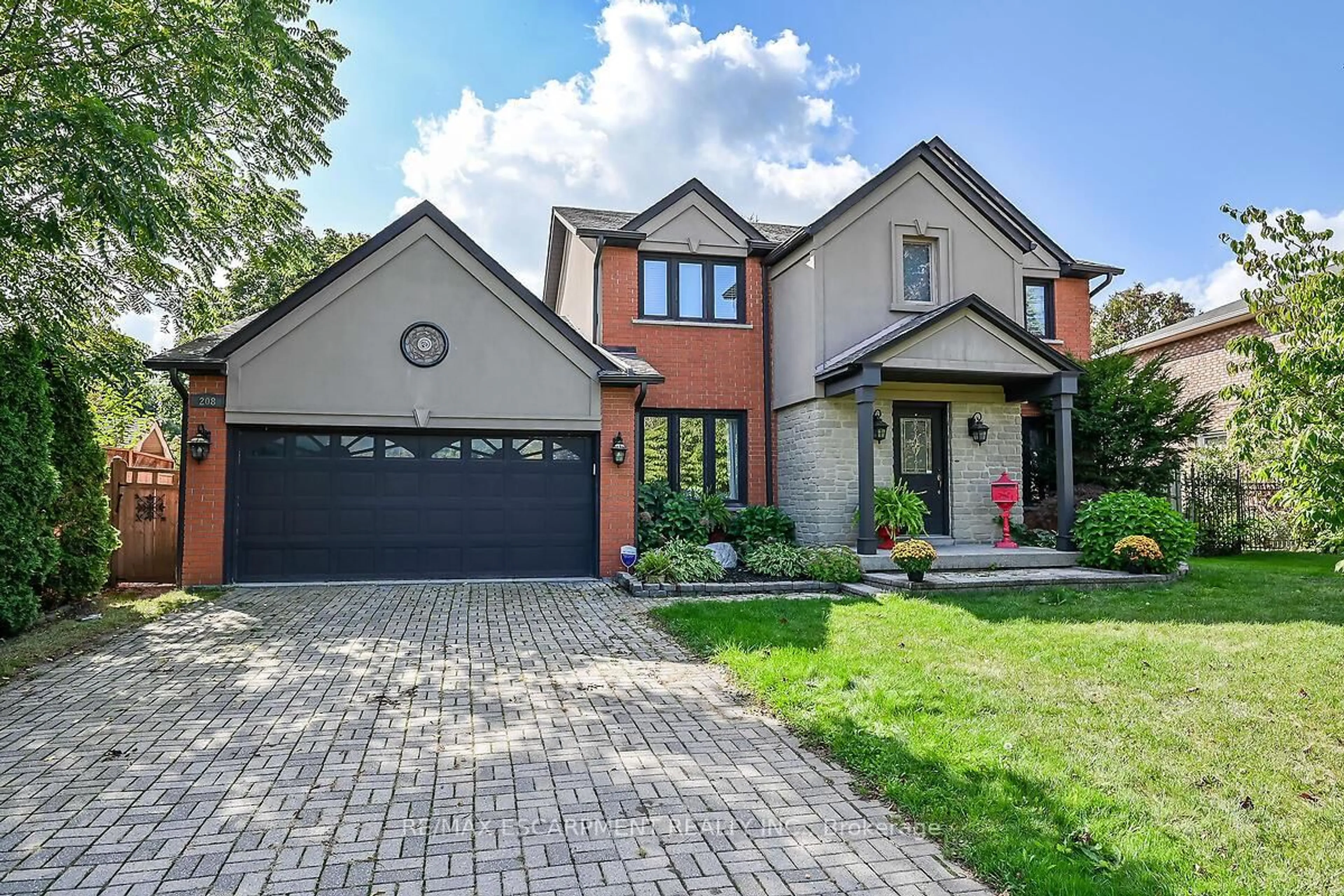 Home with brick exterior material, street for 208 Meadowbrook Dr, Hamilton Ontario L9G 4P5