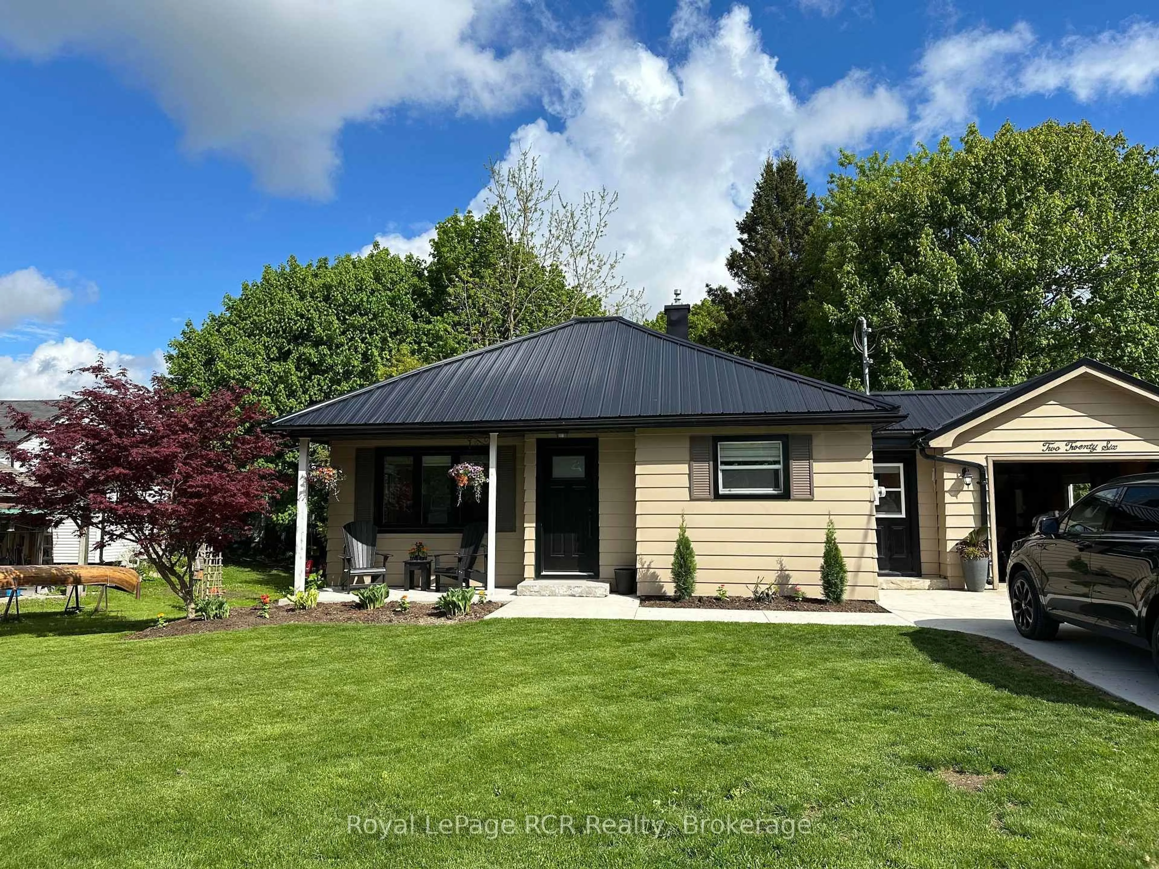 A pic from outside/outdoor area/front of a property/back of a property/a pic from drone, street for 226 Birmingham St, Wellington North Ontario N0G 2L1