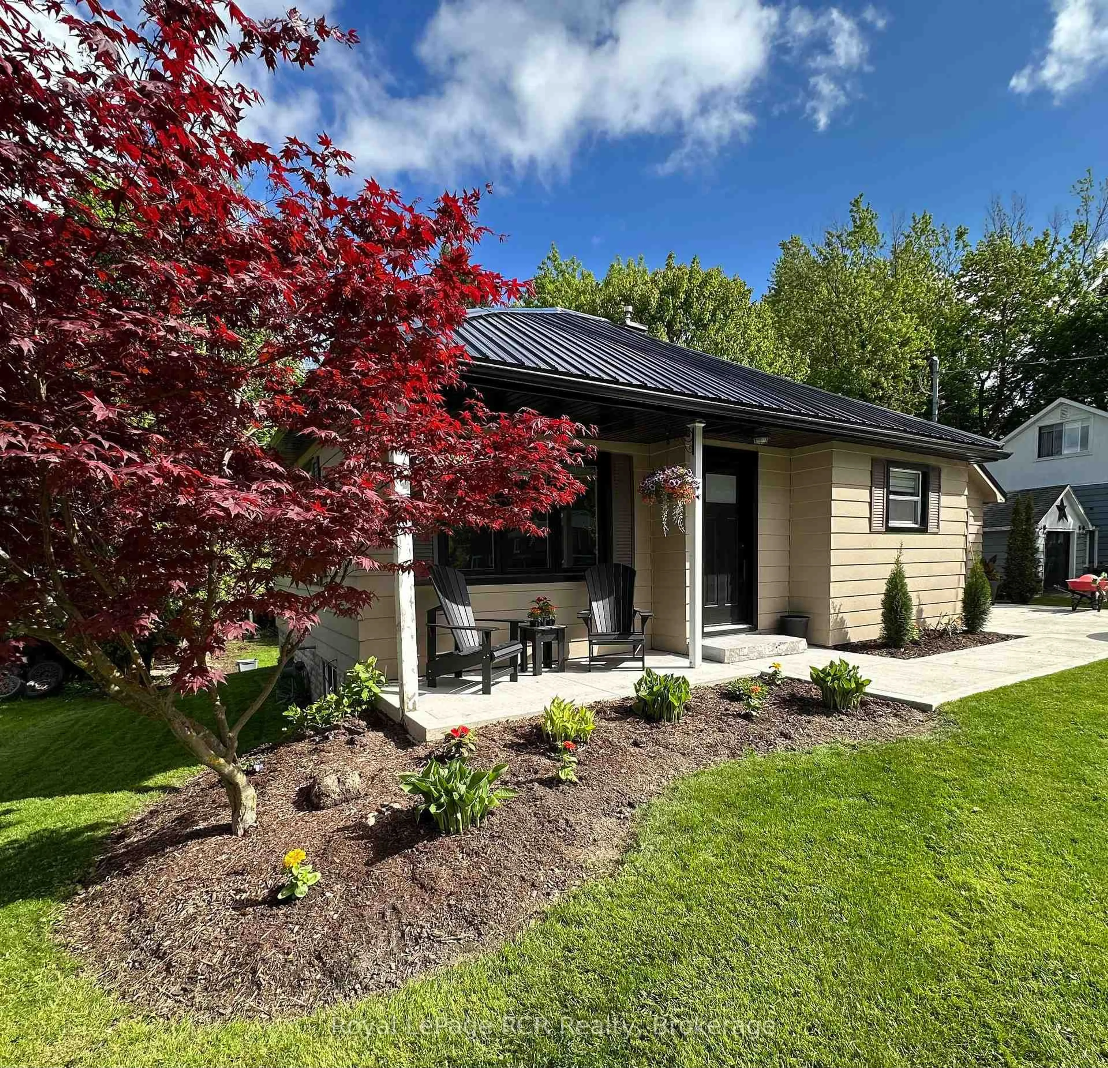 Home with vinyl exterior material, street for 226 Birmingham St, Wellington North Ontario N0G 2L1