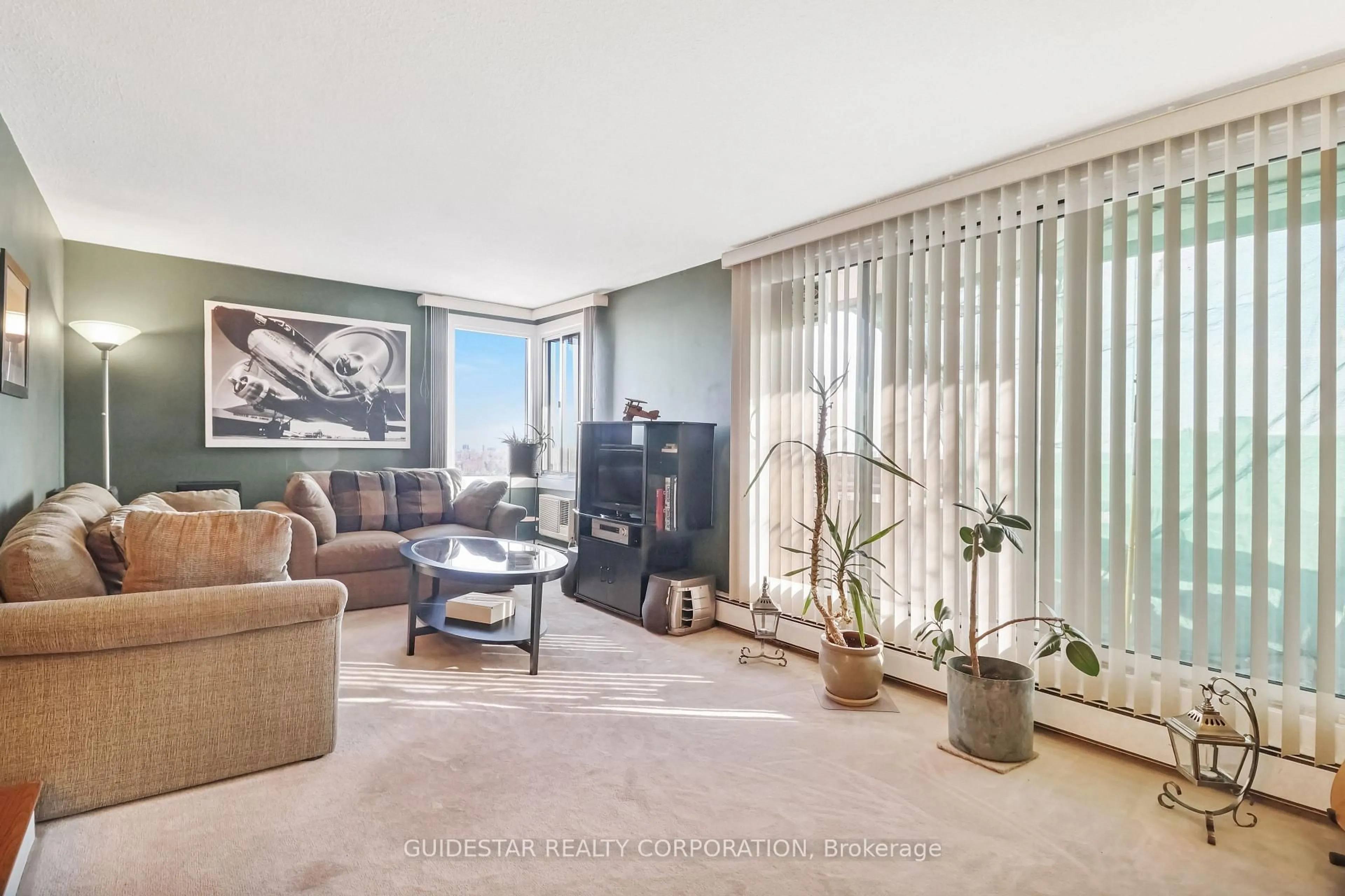 Living room with furniture, unknown for 1171 Ambleside Dr #1906, Ottawa Ontario K2B 8E1