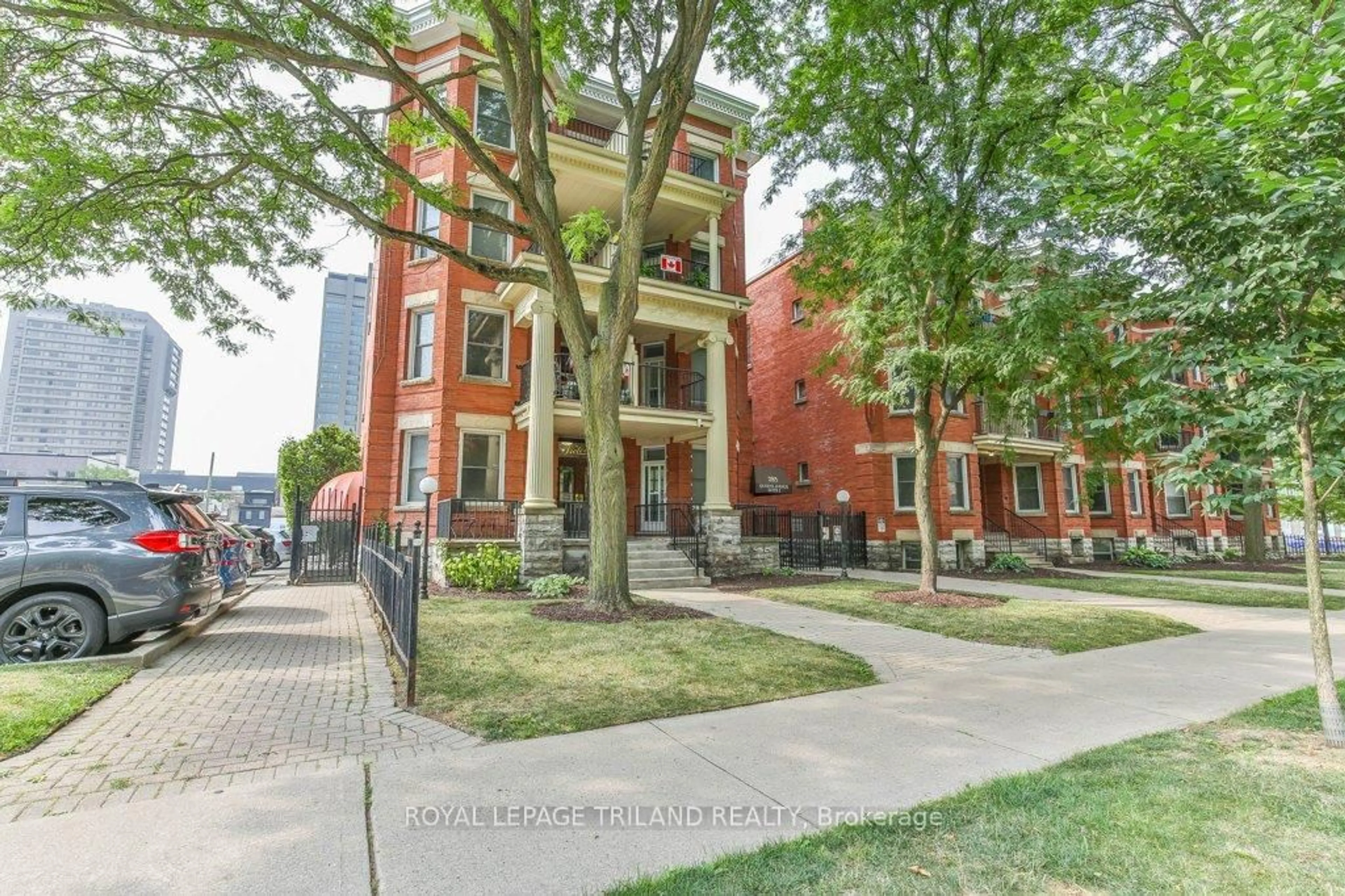 Home with brick exterior material, street for 285 QUEENS Ave #101, London East Ontario N6B 1X2