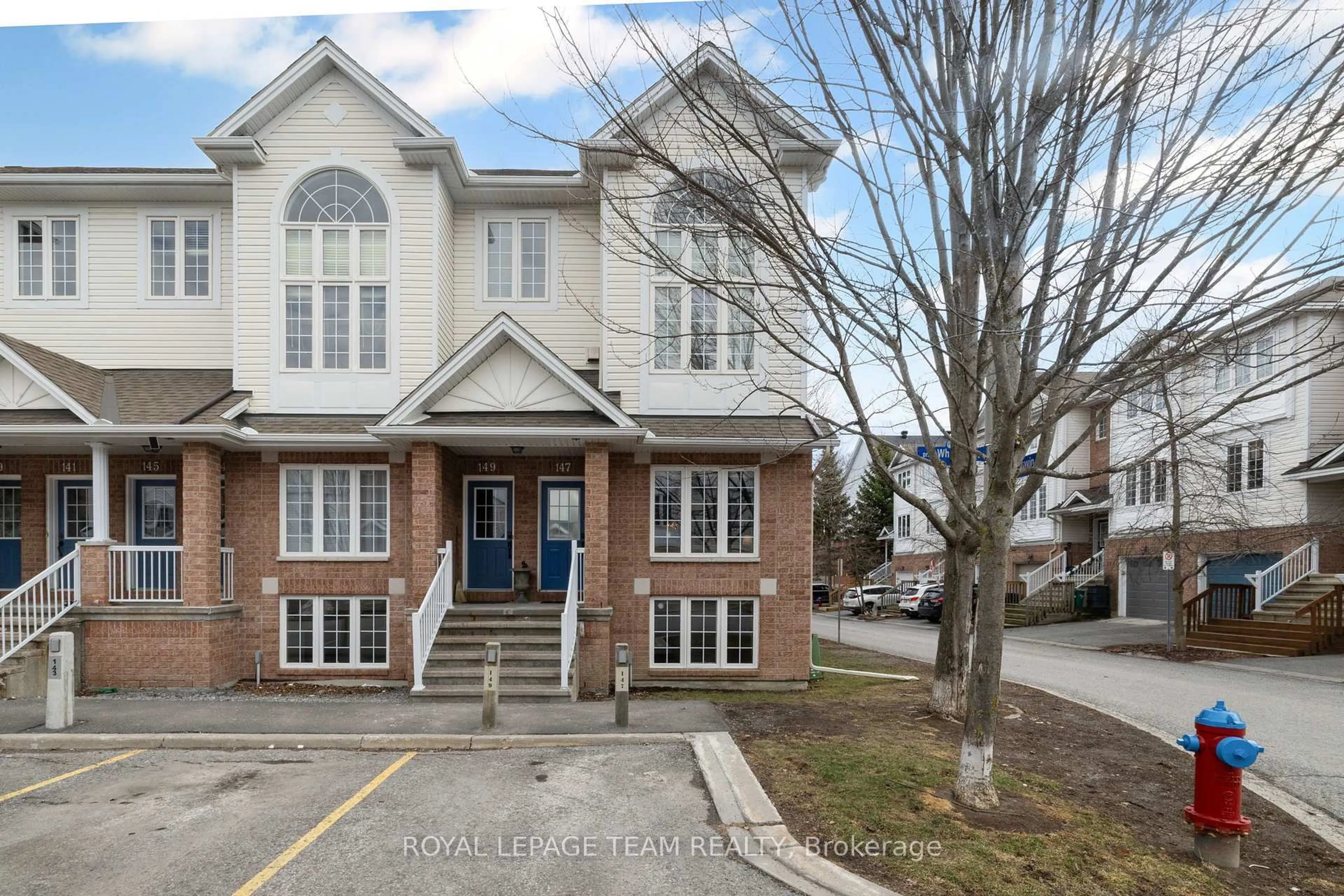 Home with brick exterior material, street for 147 Wharhol Private, Ottawa Ontario K2H 1G5