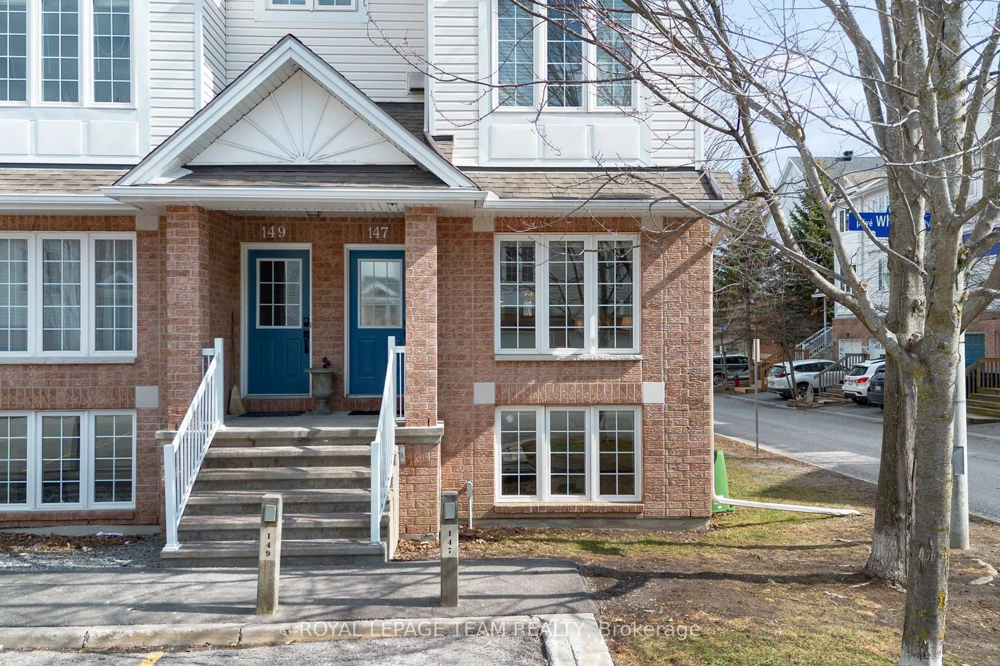Home with brick exterior material, street for 147 Wharhol Private, Ottawa Ontario K2H 1G5