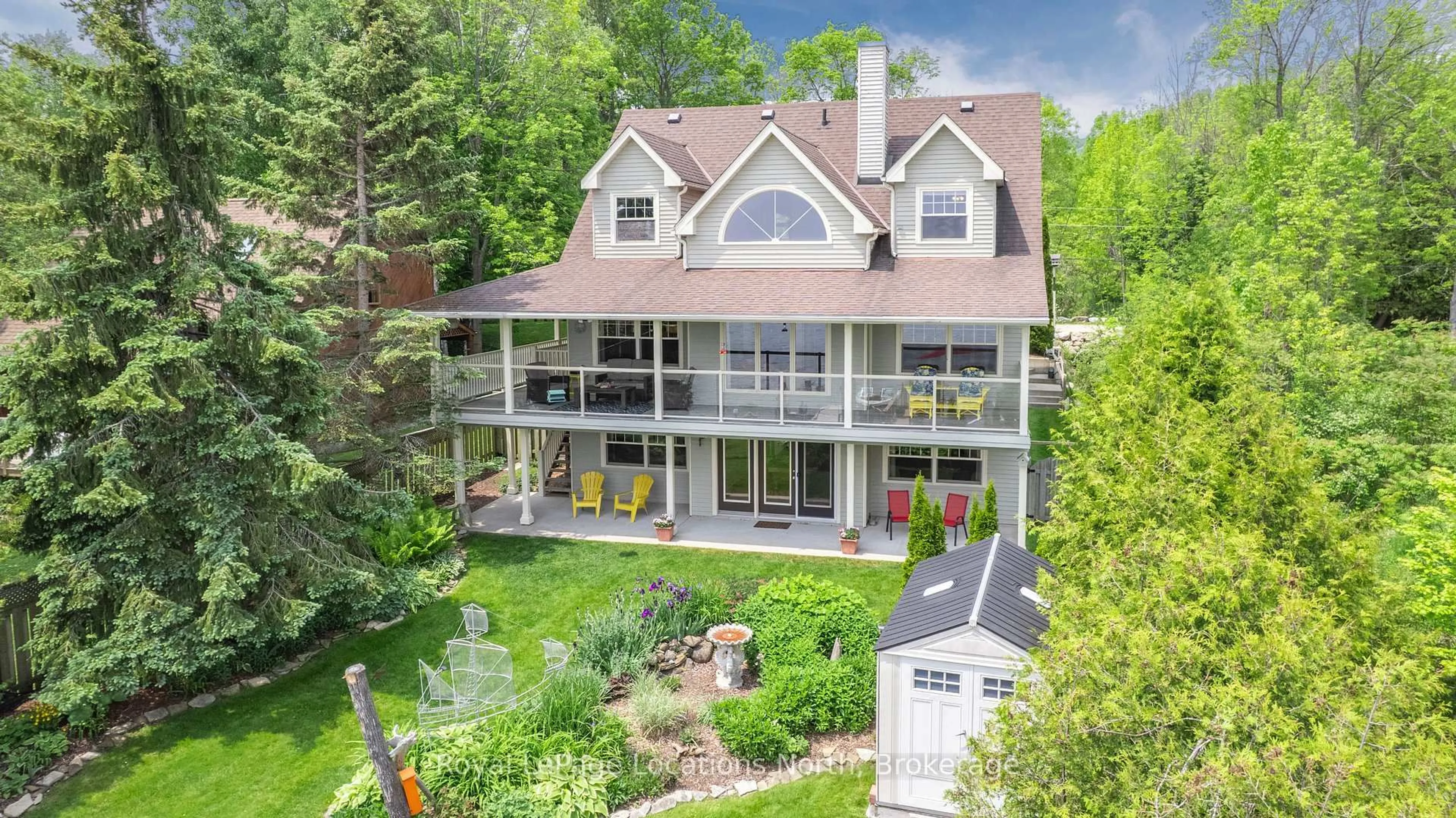 A pic from outside/outdoor area/front of a property/back of a property/a pic from drone, water/lake/river/ocean view for 261 Cedar Ave, Meaford Ontario N4L 1W5