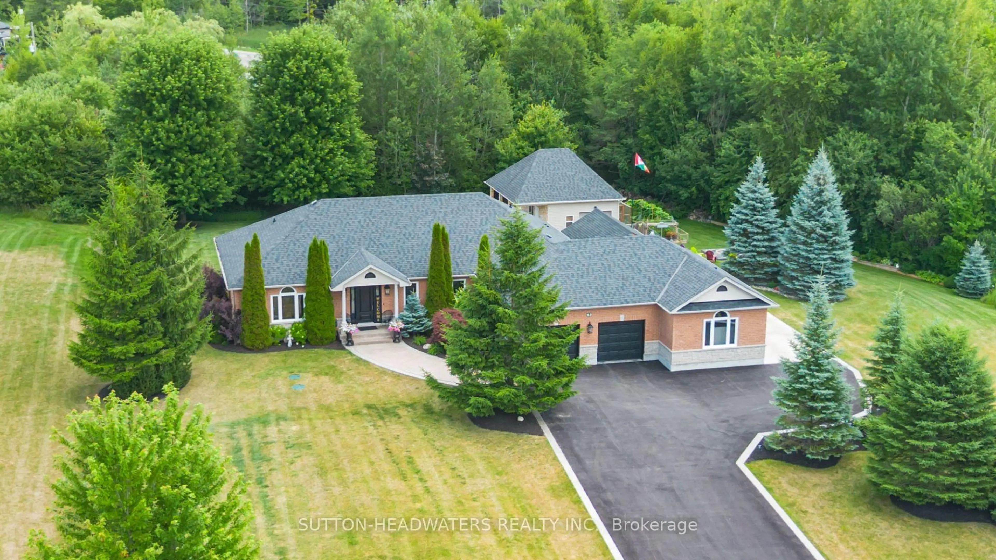 A pic from outside/outdoor area/front of a property/back of a property/a pic from drone, mountain view for 63 Brookhaven Cres, East Garafraxa Ontario L9W 2Y9