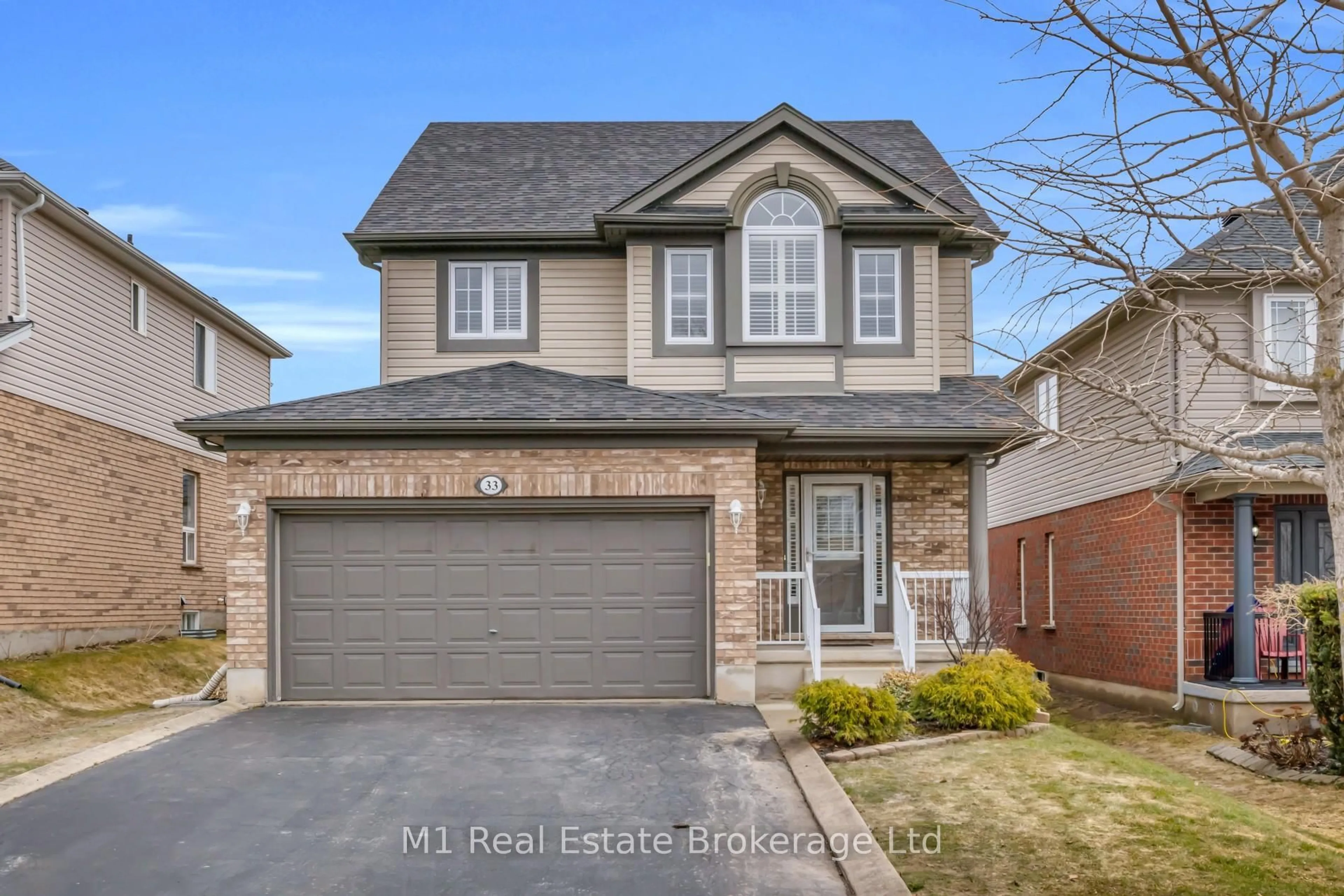 Home with brick exterior material, street for 33 Hilltop Rd, Guelph Ontario N1E 7L4
