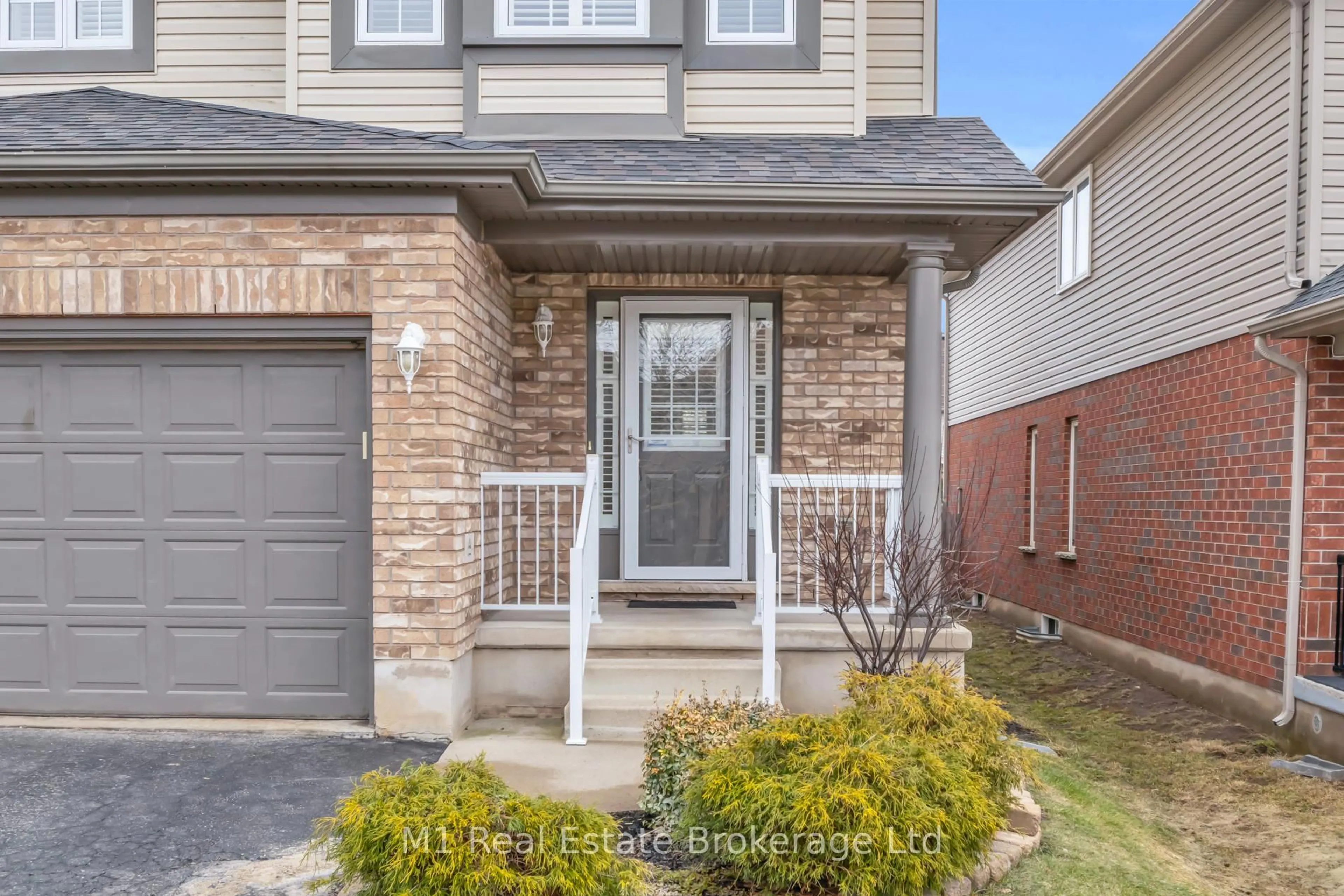 Home with brick exterior material, street for 33 Hilltop Rd, Guelph Ontario N1E 7L4
