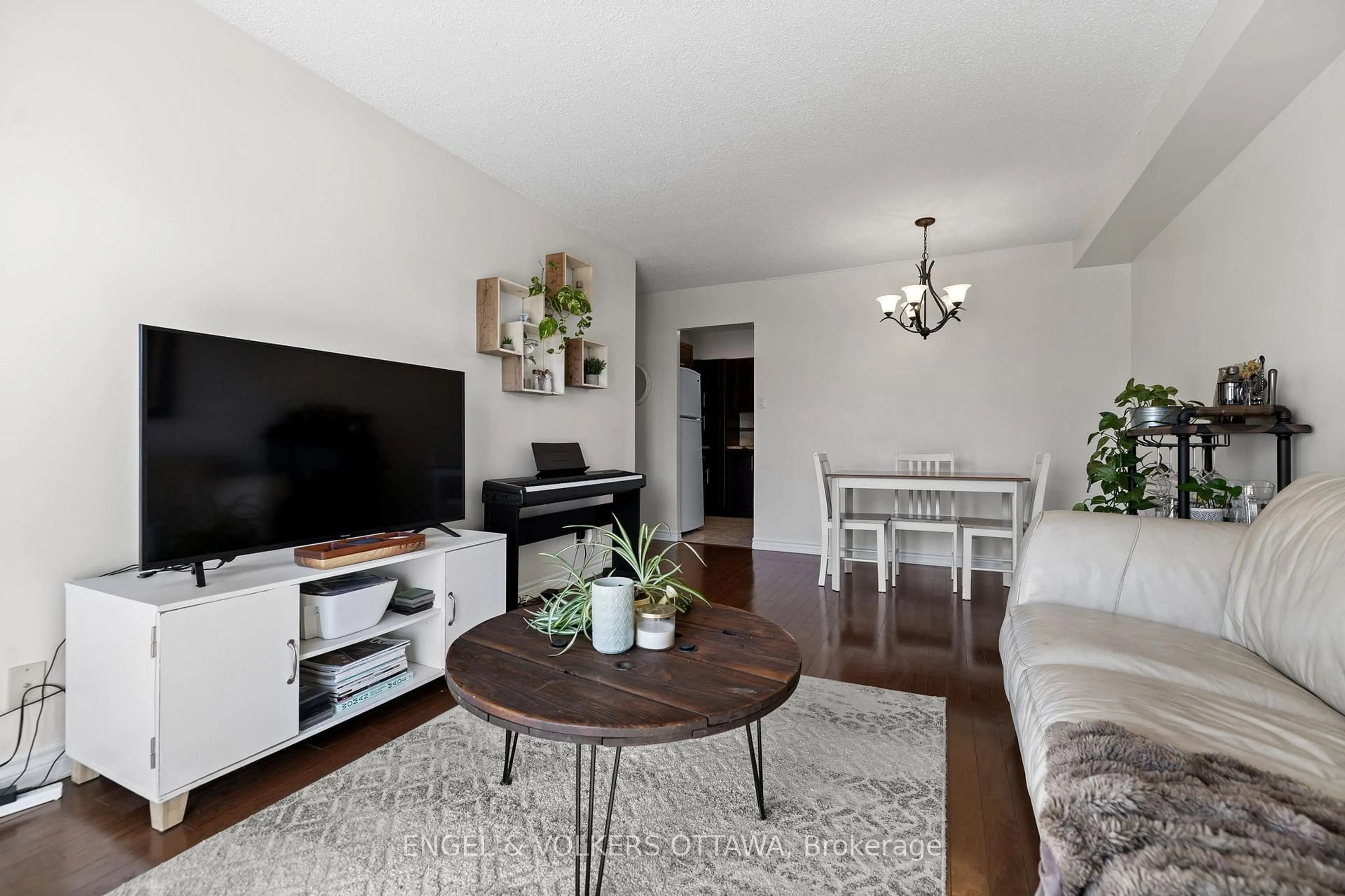 Living room with furniture, wood/laminate floor for 158A Mcarthur Ave #303, Ottawa Ontario K1L 7E7