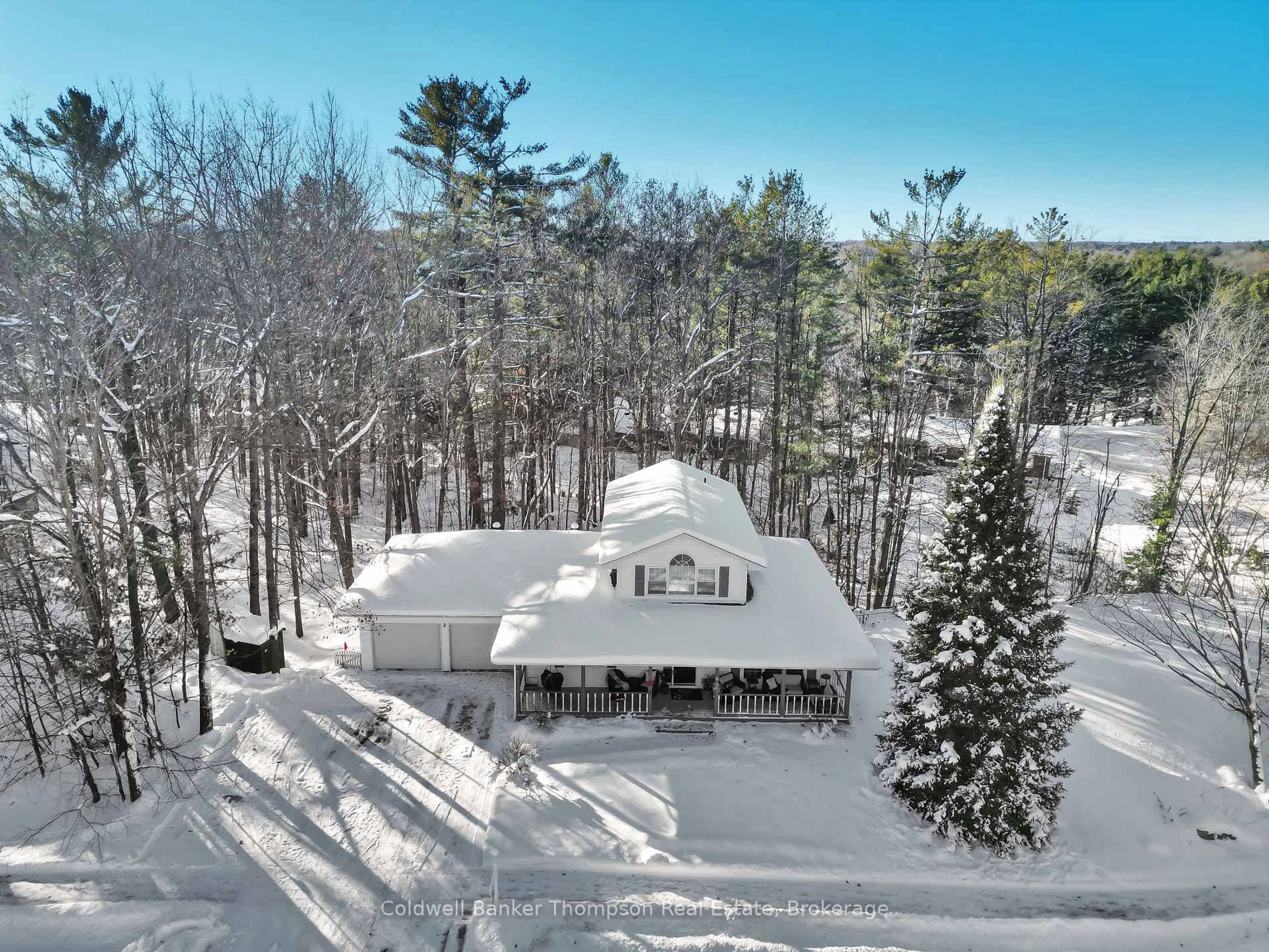 A pic from outside/outdoor area/front of a property/back of a property/a pic from drone, forest/trees view for 2 The Granite Bluff, Bracebridge Ontario P1L 1L4