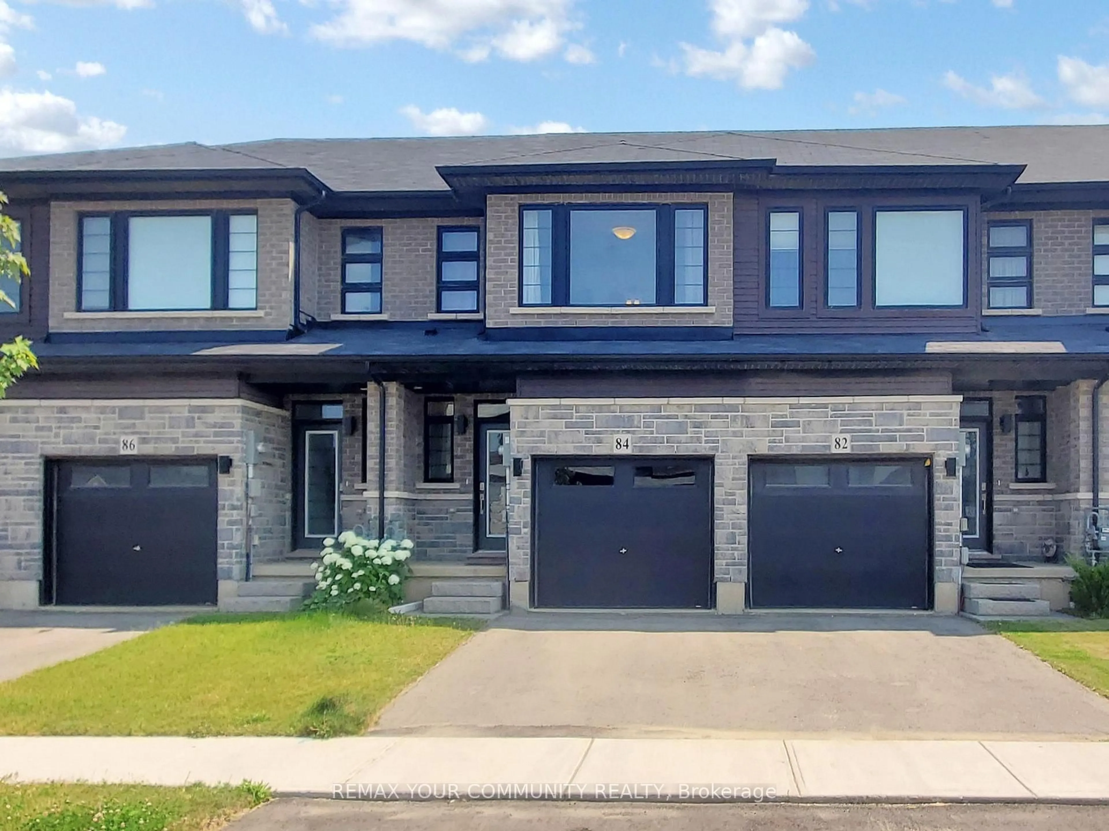 Home with brick exterior material, street for 84 June Callwood Way, Brantford Ontario N3T 0T2