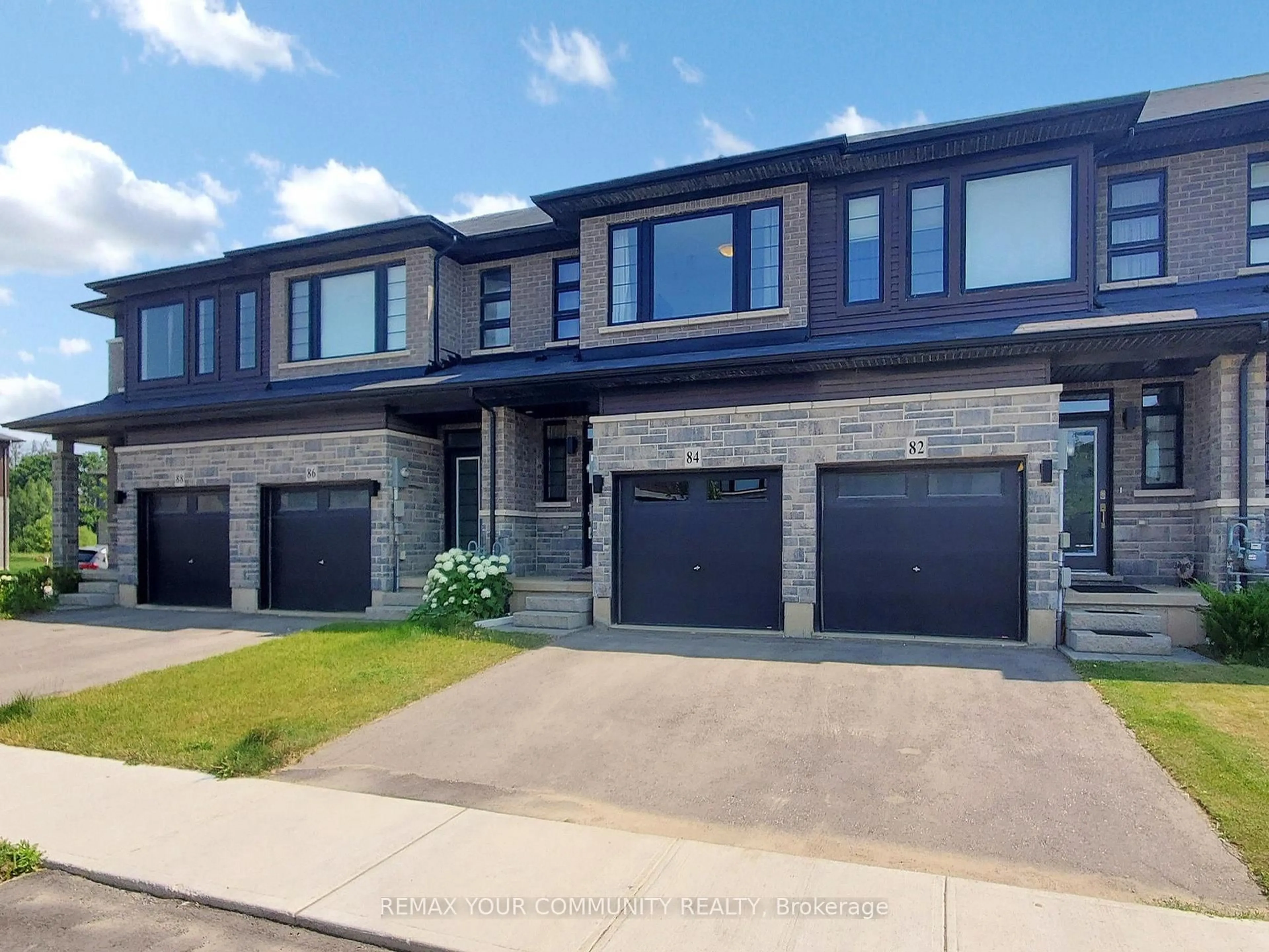 Home with brick exterior material, street for 84 June Callwood Way, Brantford Ontario N3T 0T2