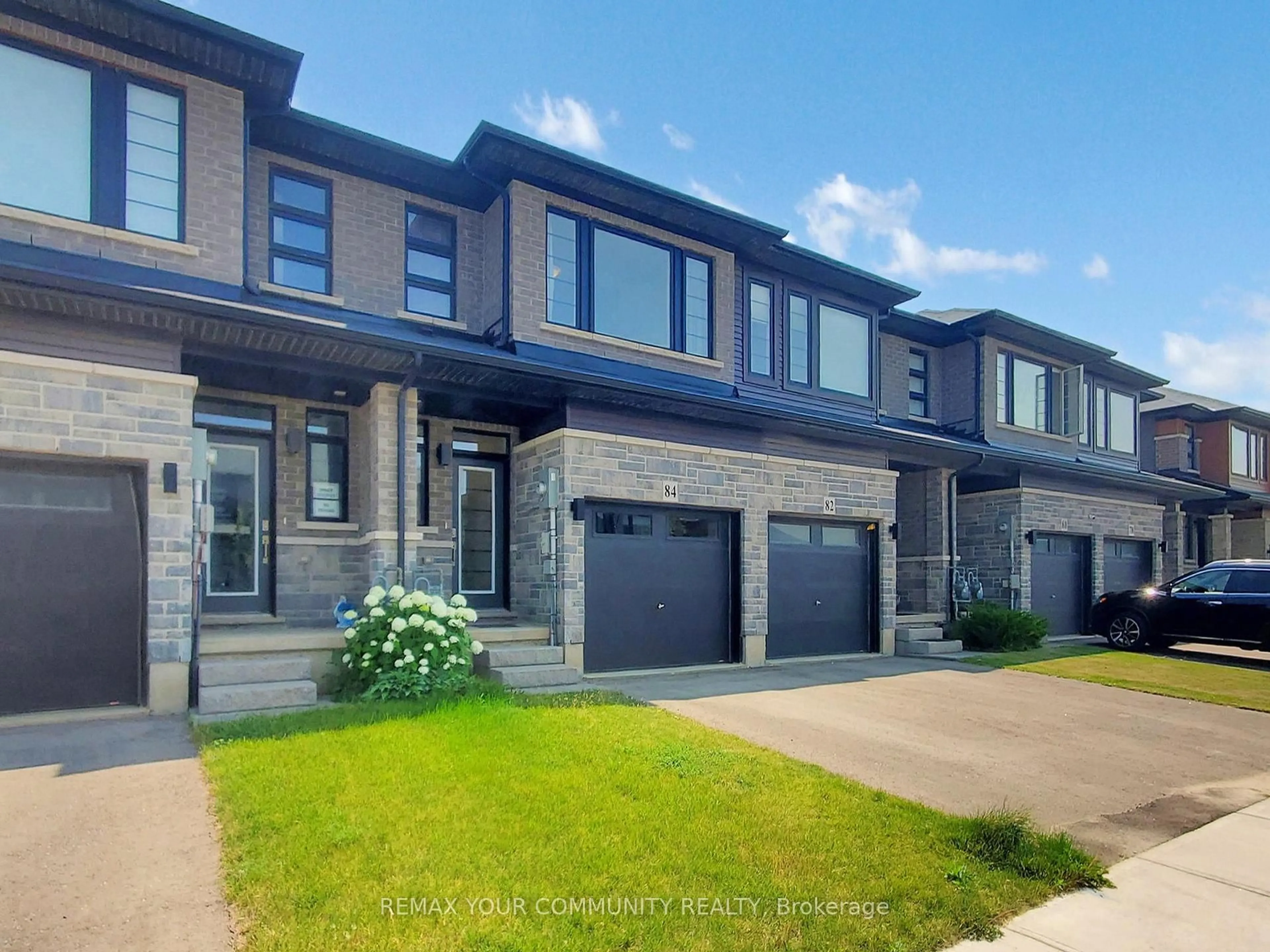Home with brick exterior material, street for 84 June Callwood Way, Brantford Ontario N3T 0T2
