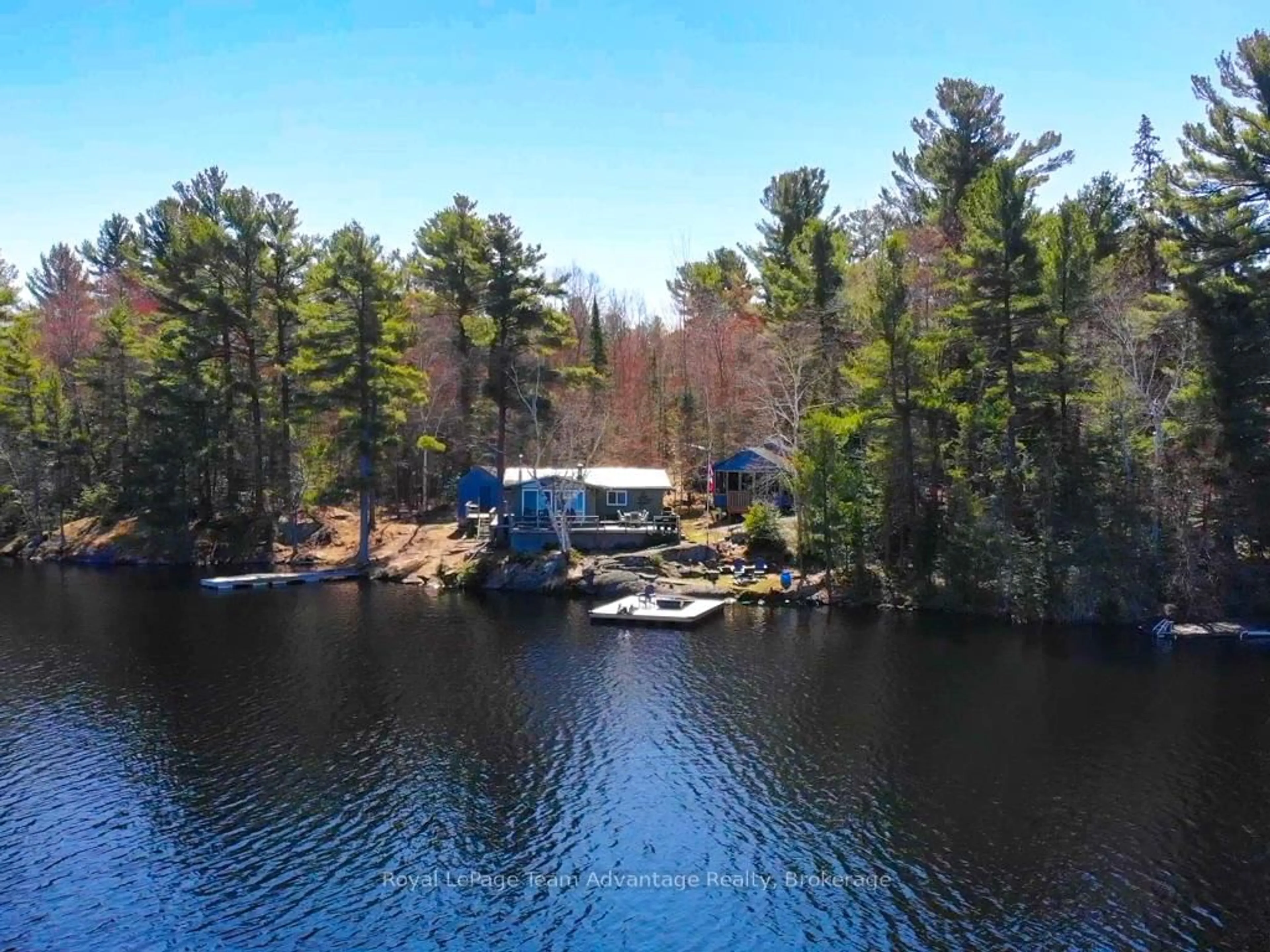 A pic from outside/outdoor area/front of a property/back of a property/a pic from drone, water/lake/river/ocean view for 66 Upper Harris Lake, Parry Sound Remote Area Ontario P0G 1K0