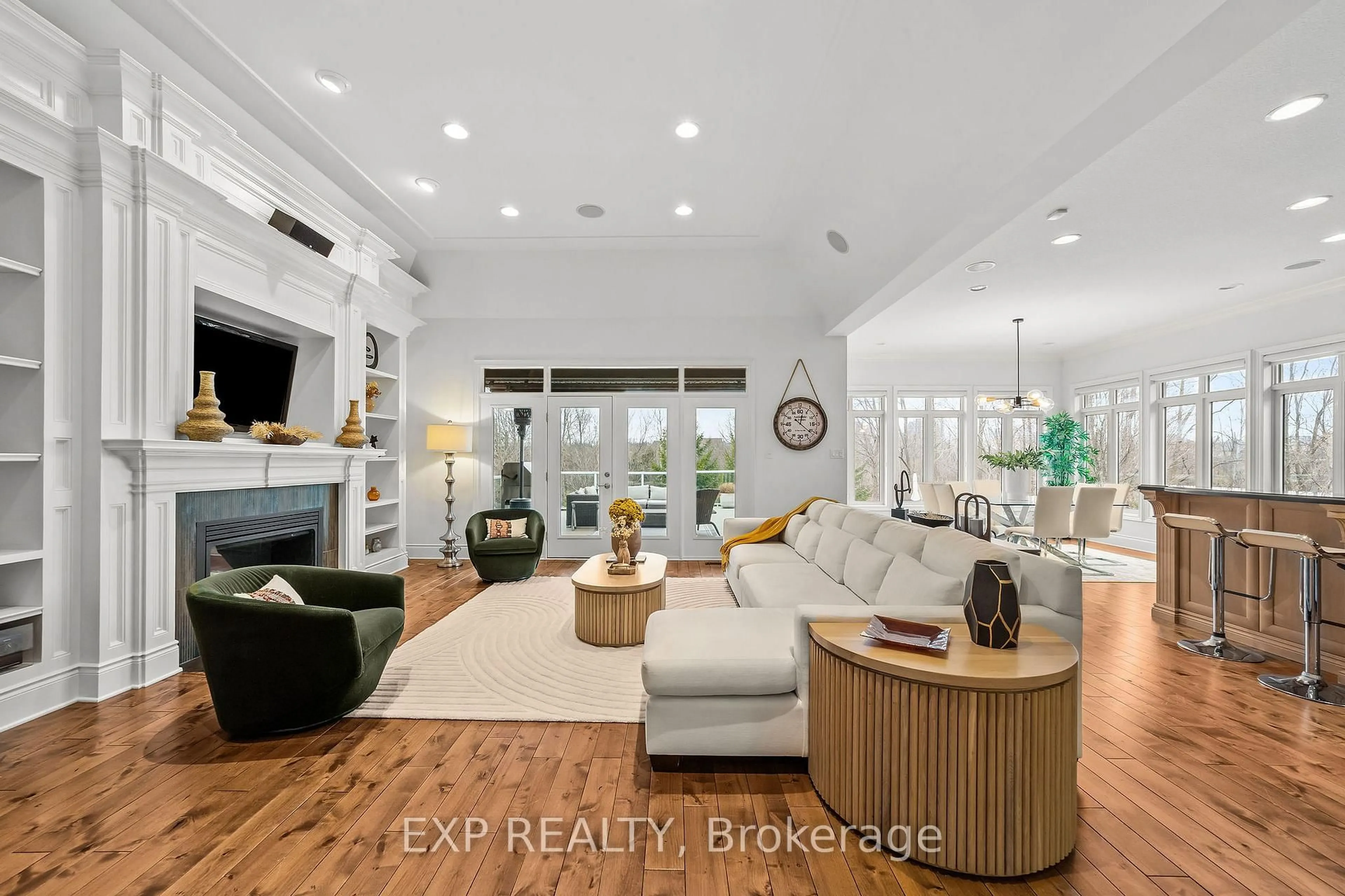 Living room with furniture, wood/laminate floor for 3319 McLauchlan Grve, London South Ontario N6P 0A6